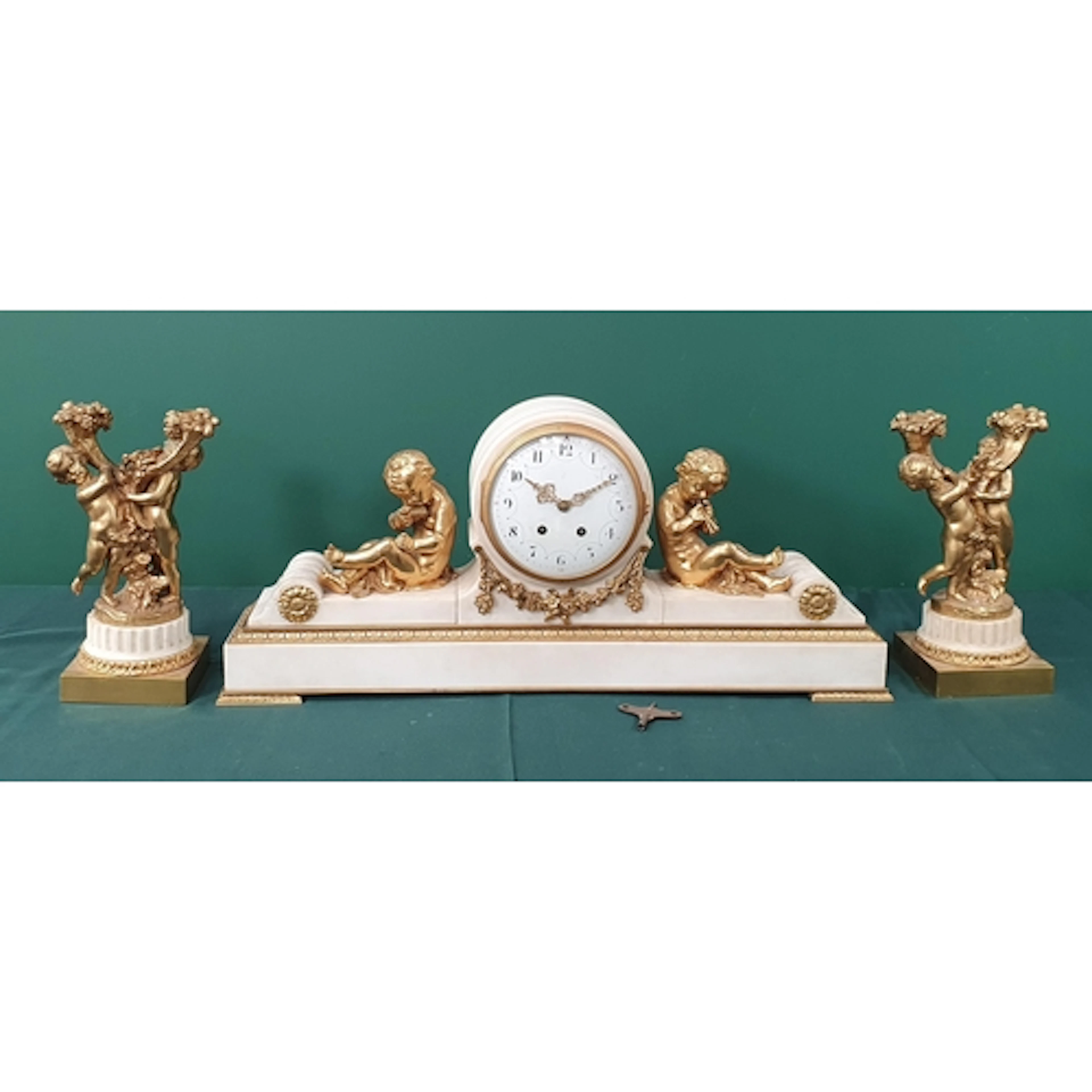 A 19th Century French gilt metal and marble Clock Garniture,...