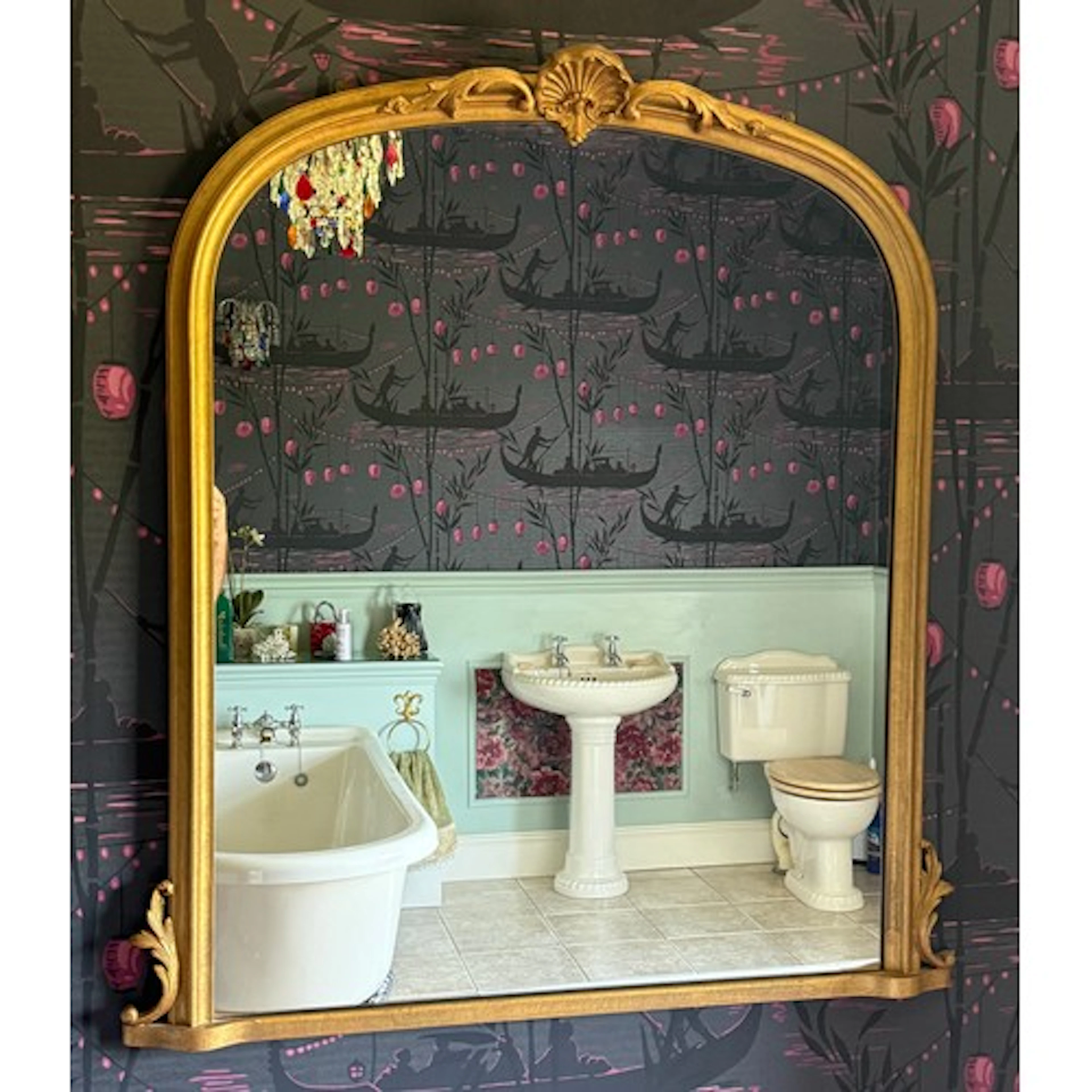 A gilt framed over mantle mirror. 112 x 102cm
