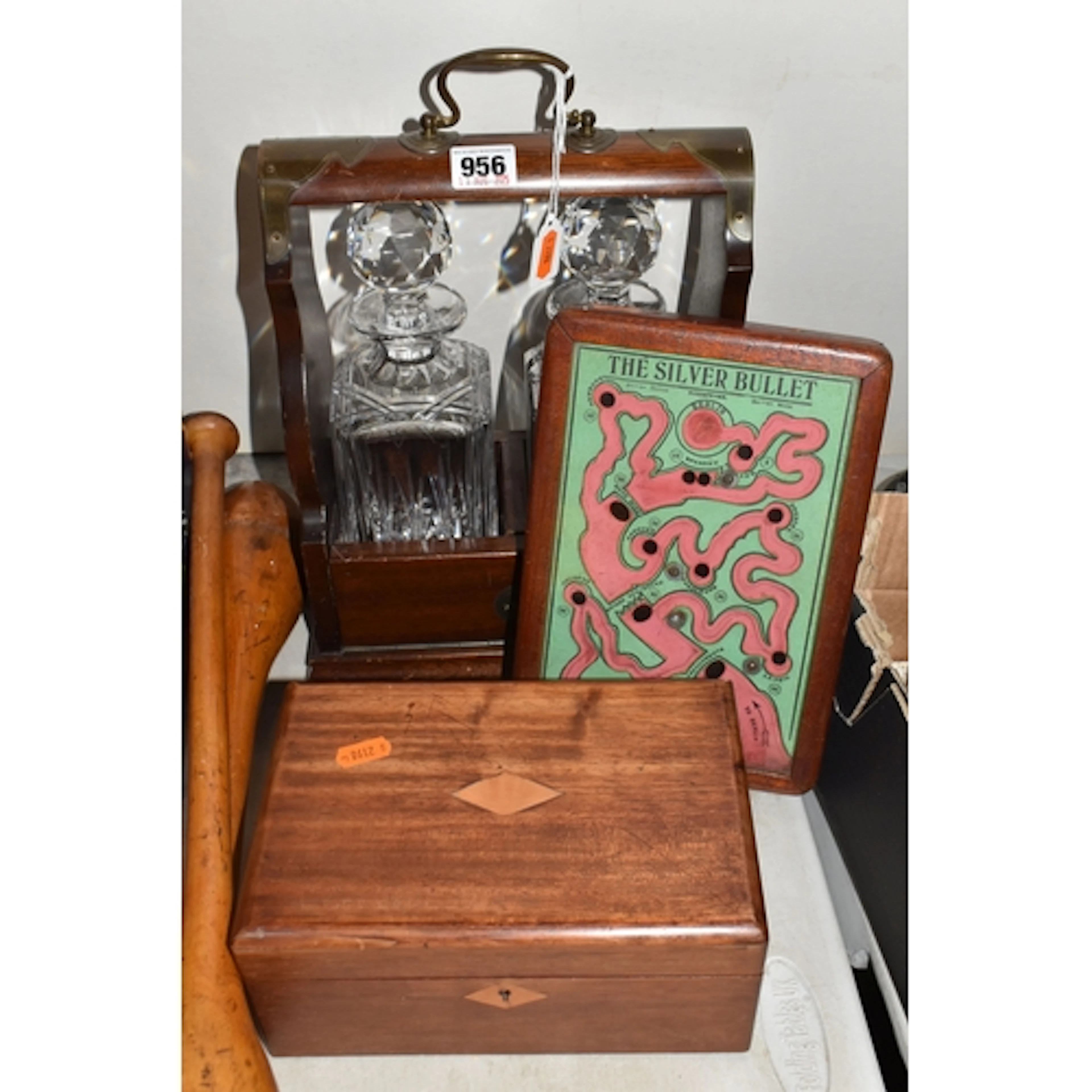 A GROUP OF TREEN ITEMS, to include a WWI hand held wooden pu...