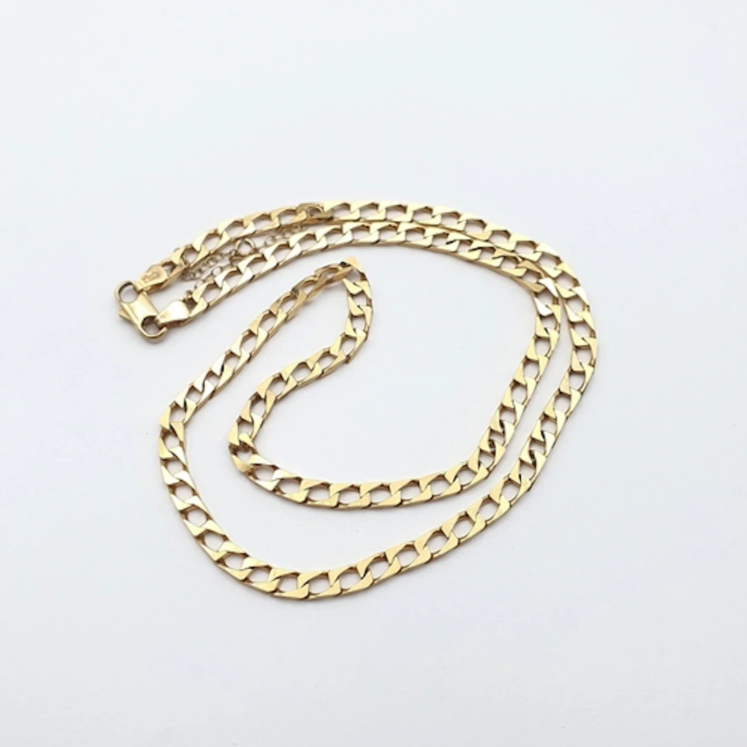 A 9ct gold flattened curb-link Chain, approx 45cms, approx 1...