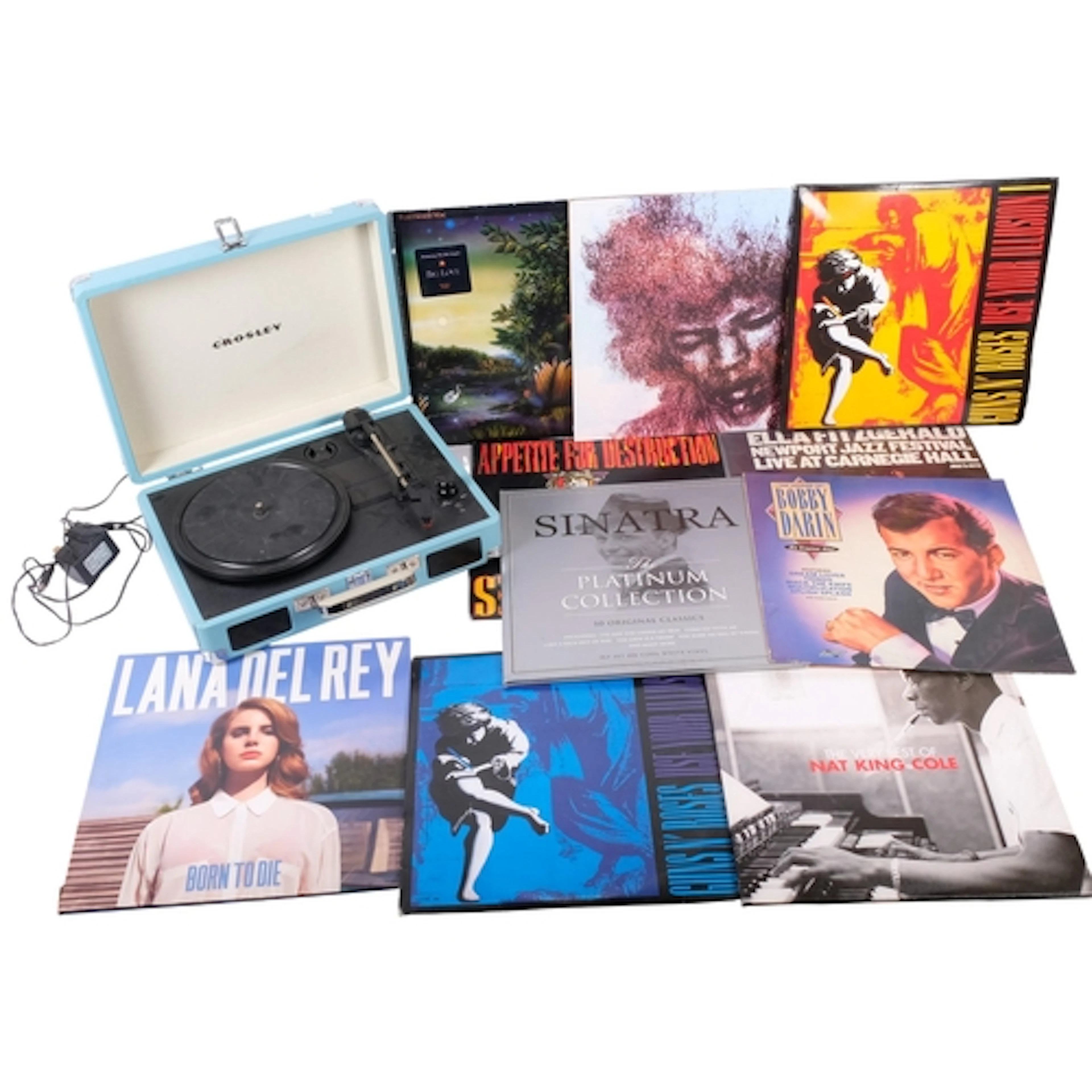 A Vintage Crosley record player, with a small selection of v...