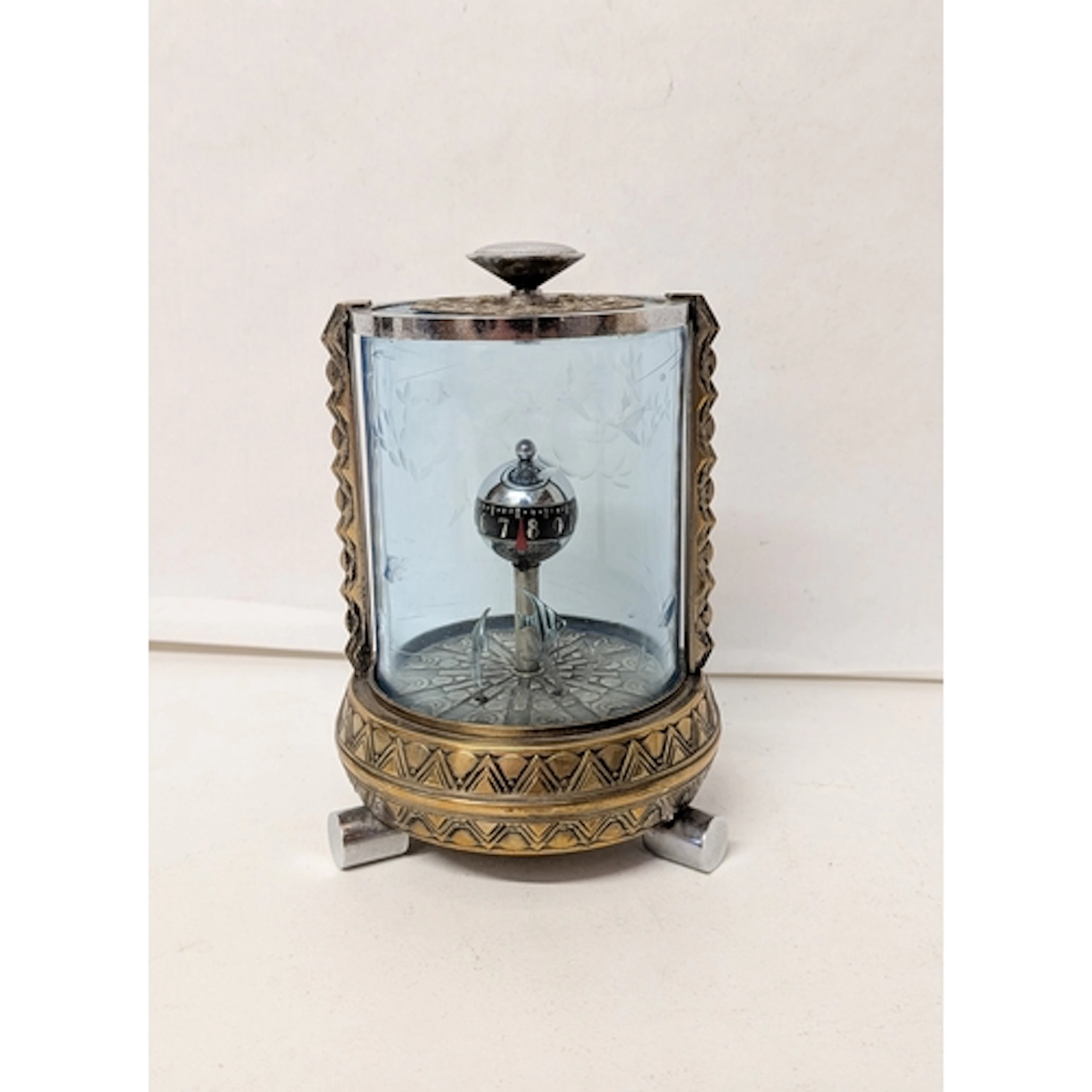 A vintage mechanical novelty aquarium style desk clock, poss...