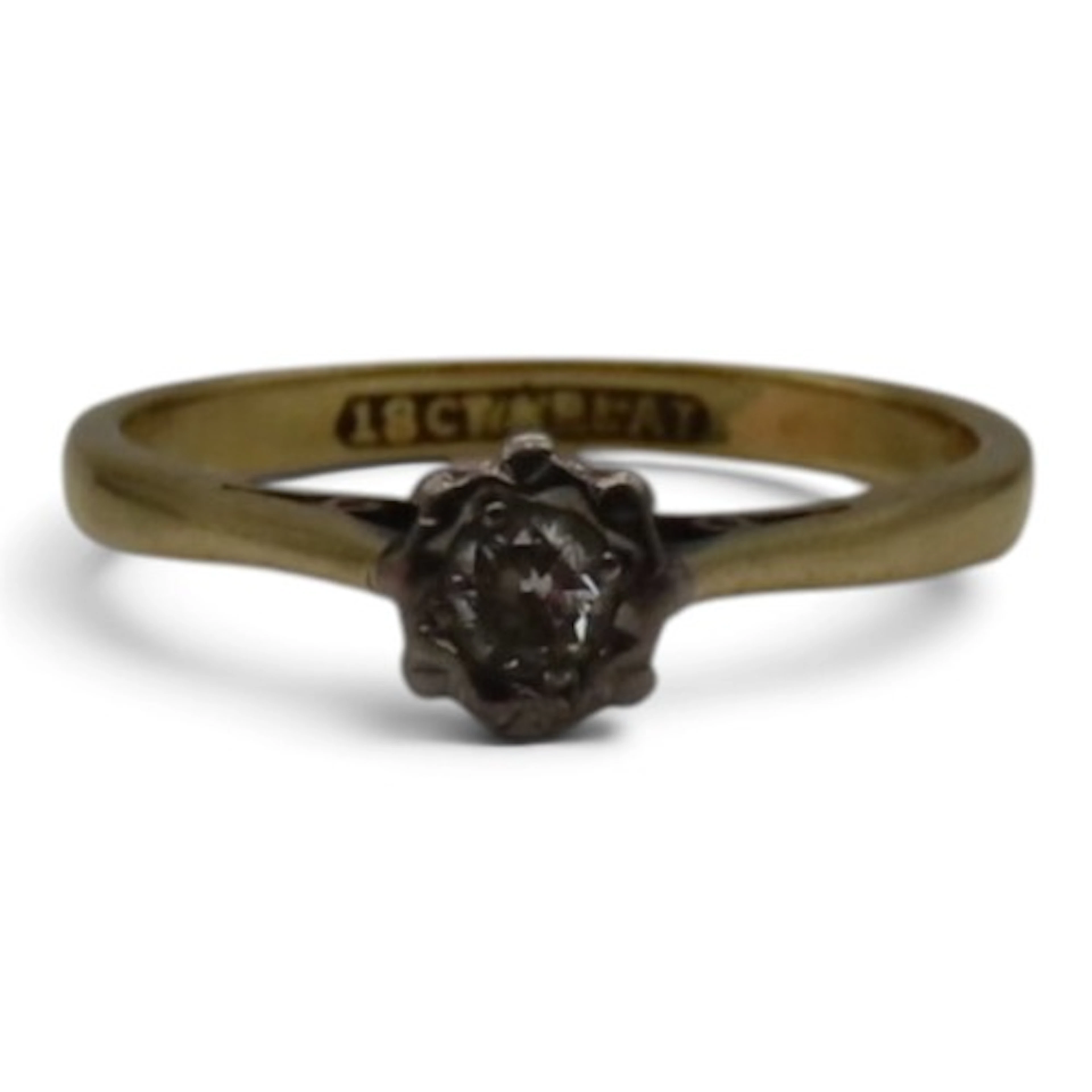 A solitaire diamond ring, illusion-set with a round brillian...