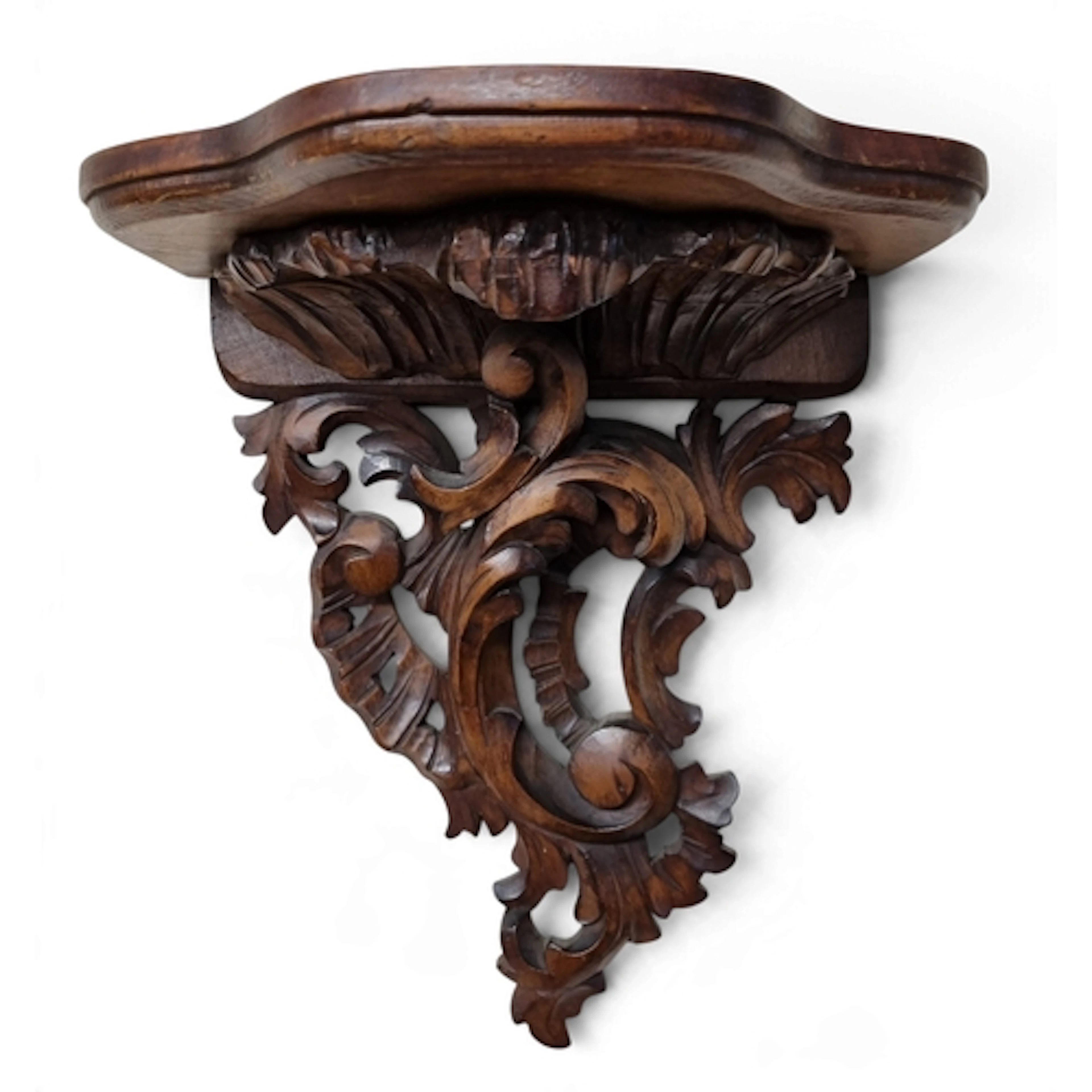 A good 19th Century Walnut Wall Bracket with highly carved o...