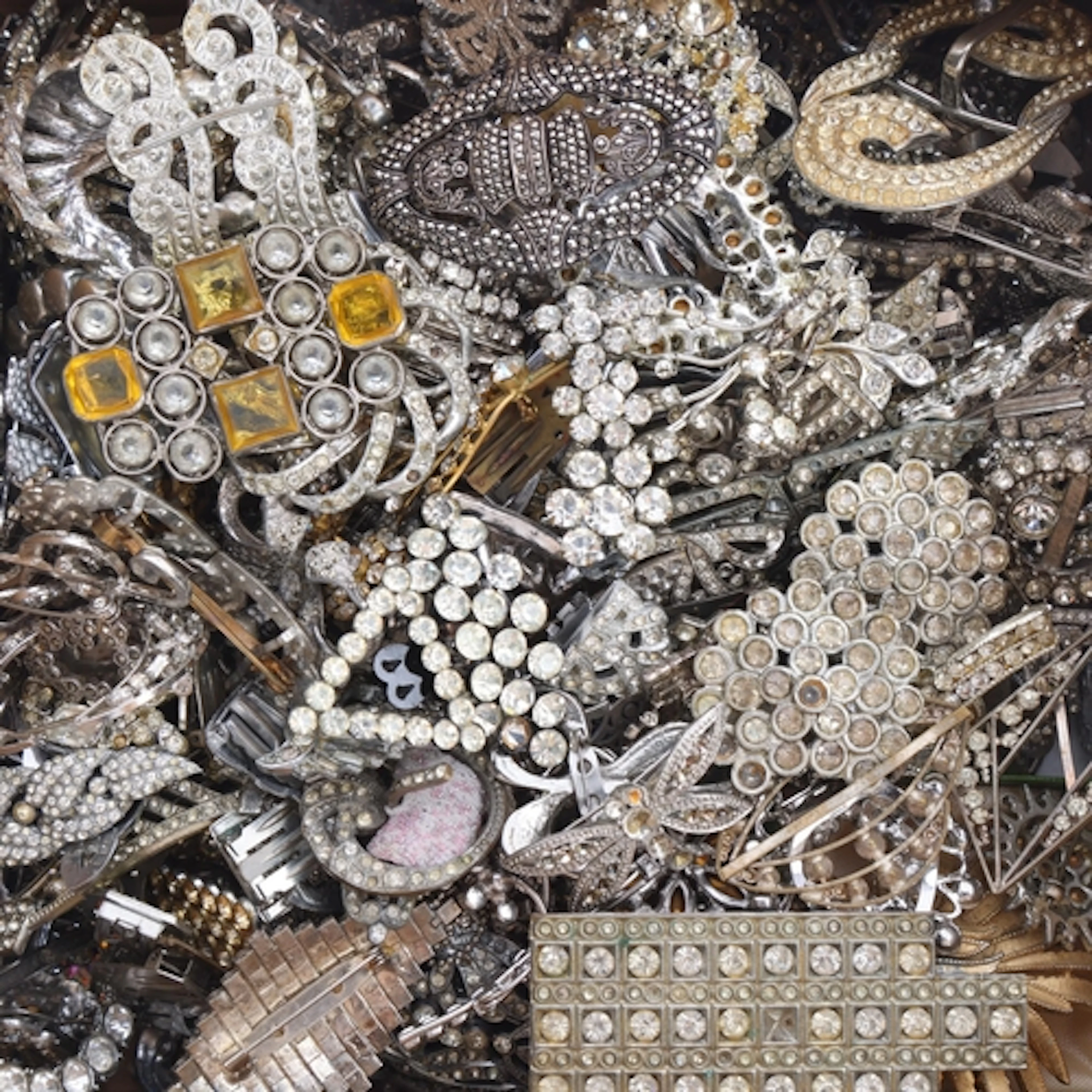 A large quantity of Vintage paste dress clips, buckles and b...