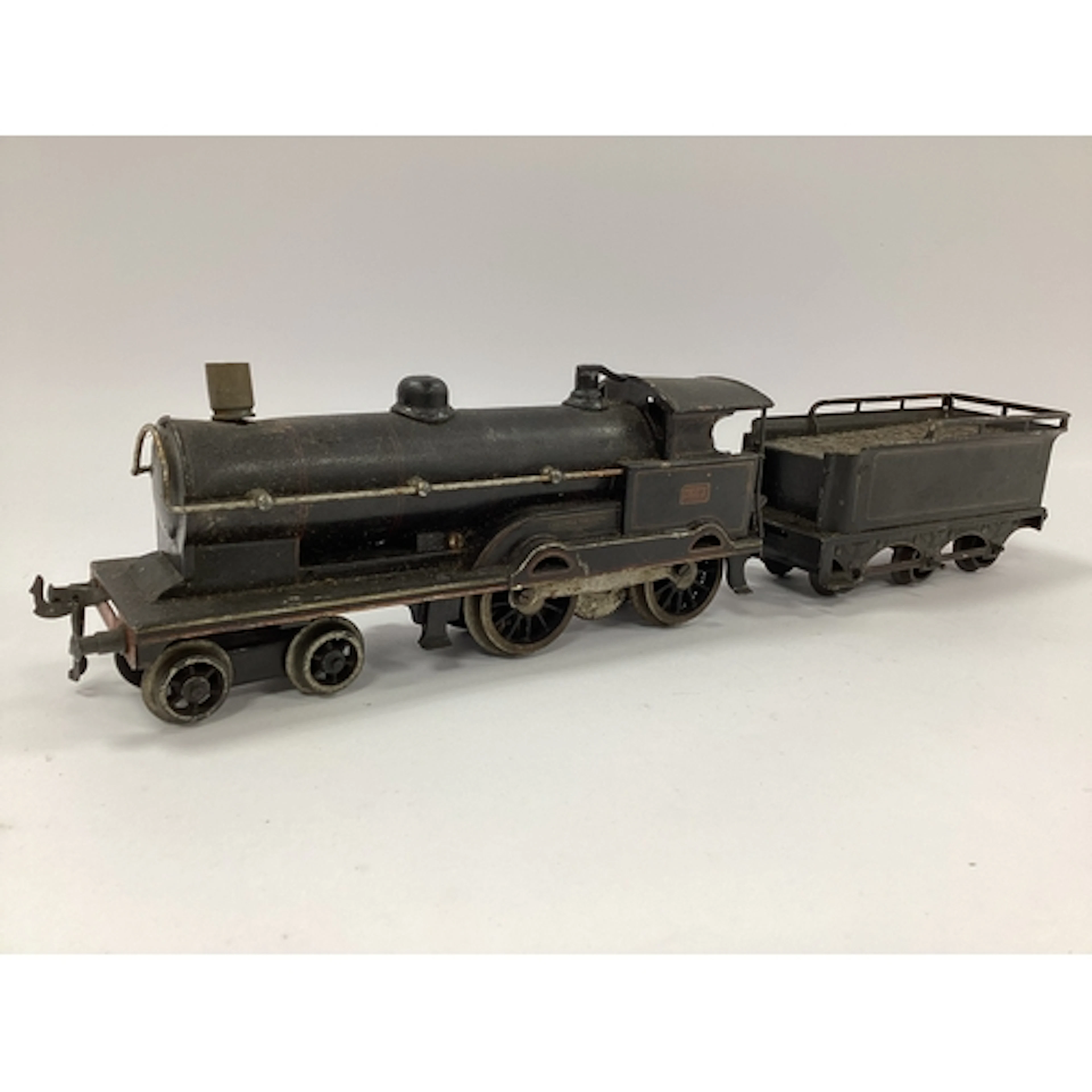 A pre-war 'O' gauge 4-4-0 George V locomotive and tender by ...