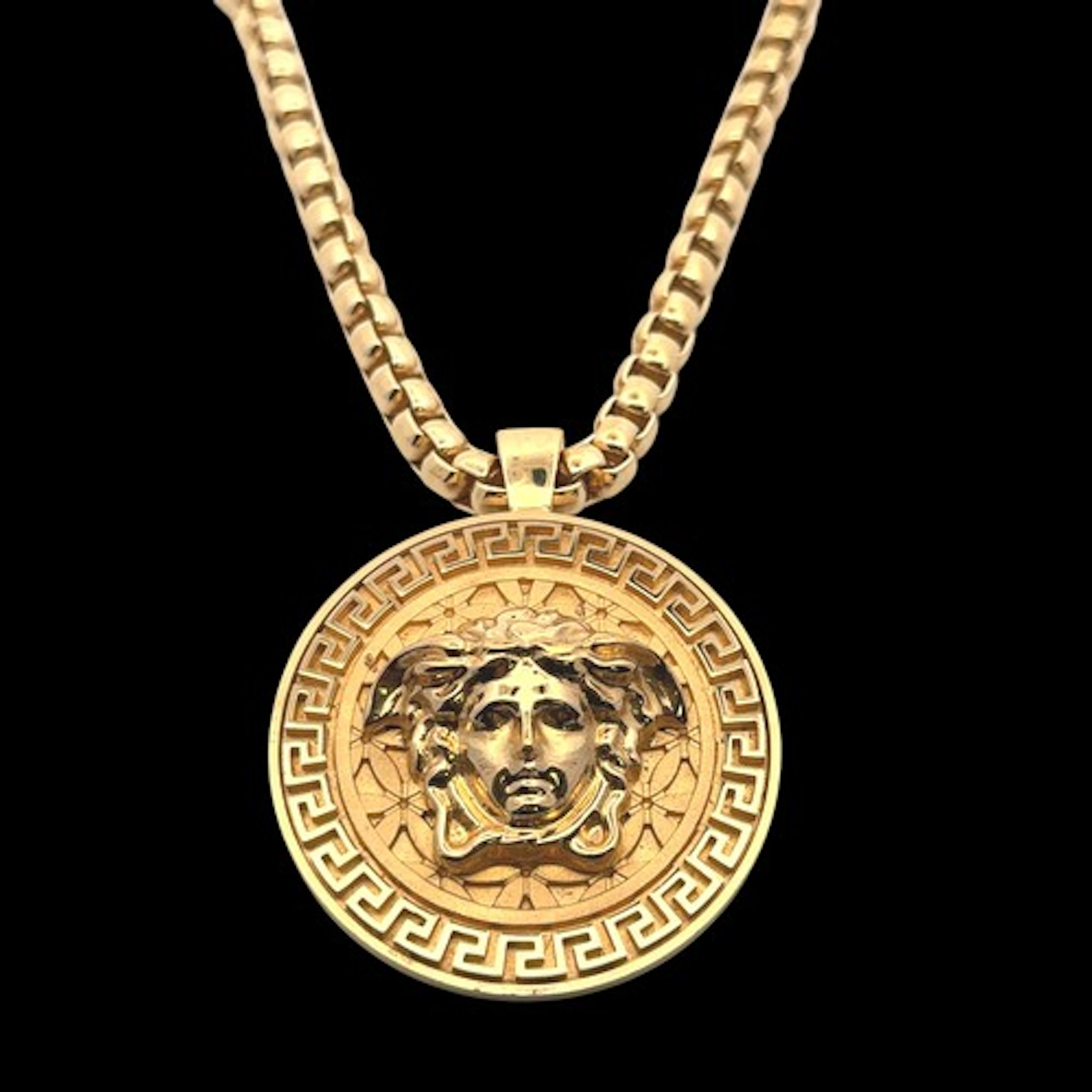 A Versace Medusa gold plated pendant necklace, the pendant f...