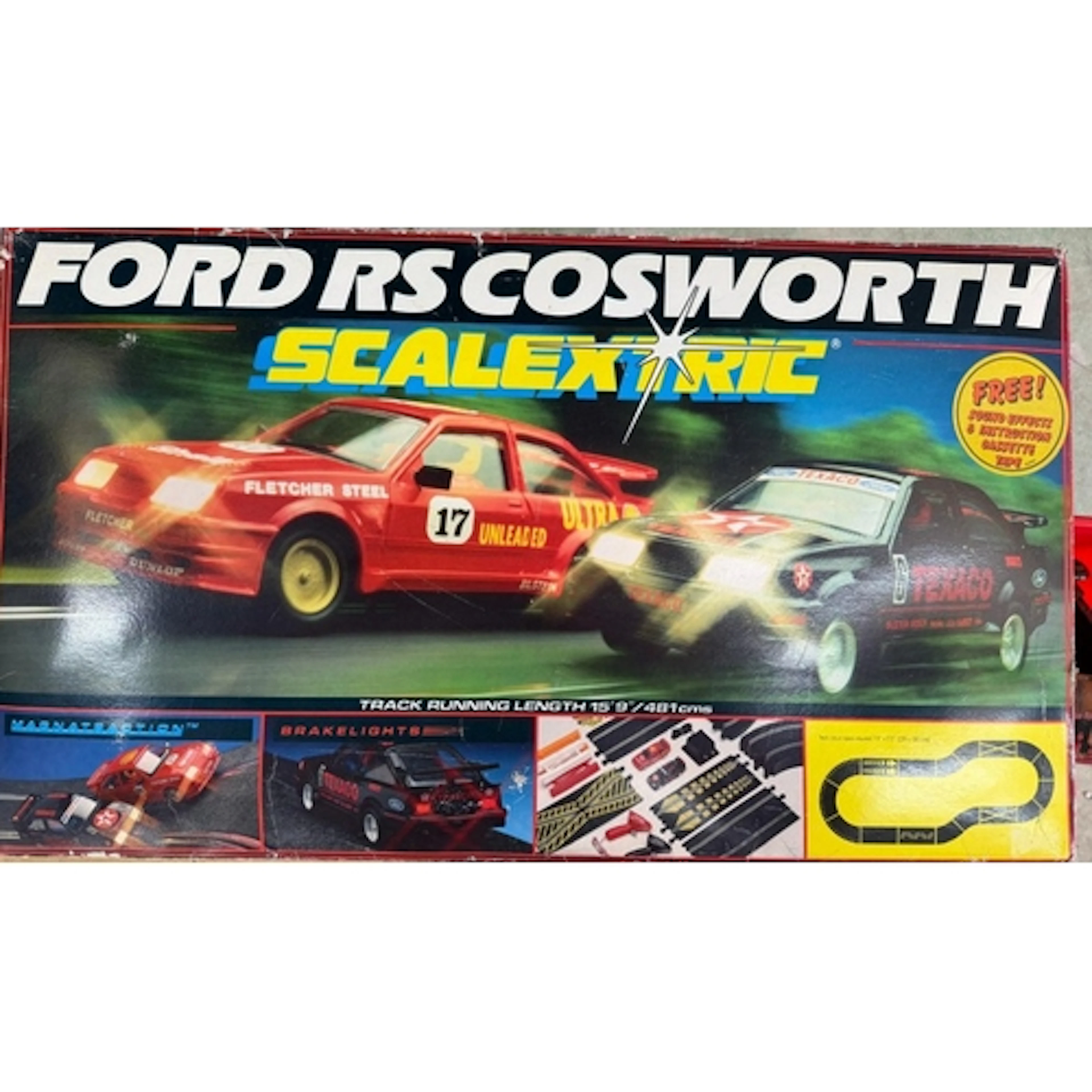A boxed Scalextric Ford RS Cosworth cars and track.