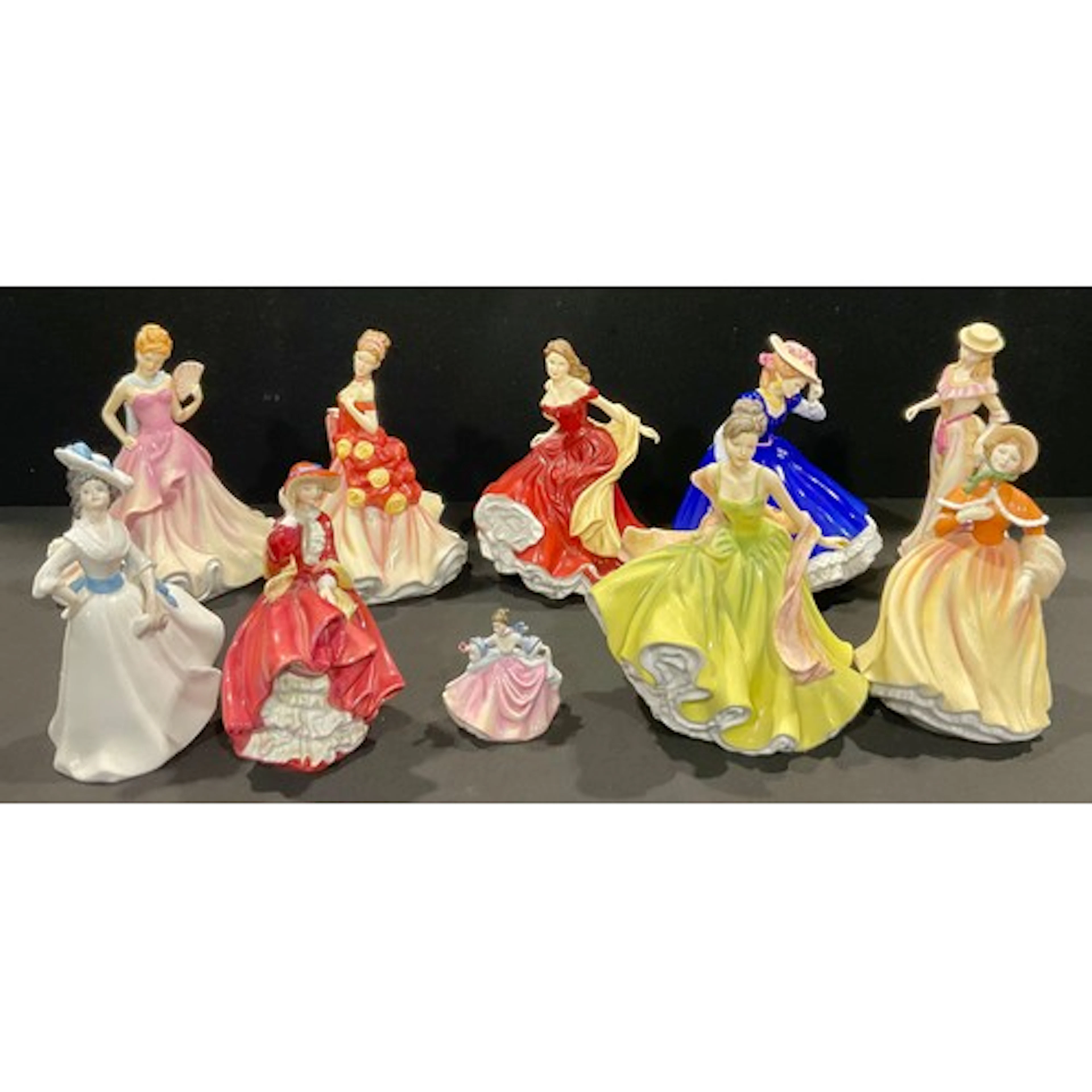 A collection of Royal Doulton figures, including Mary, Figur...