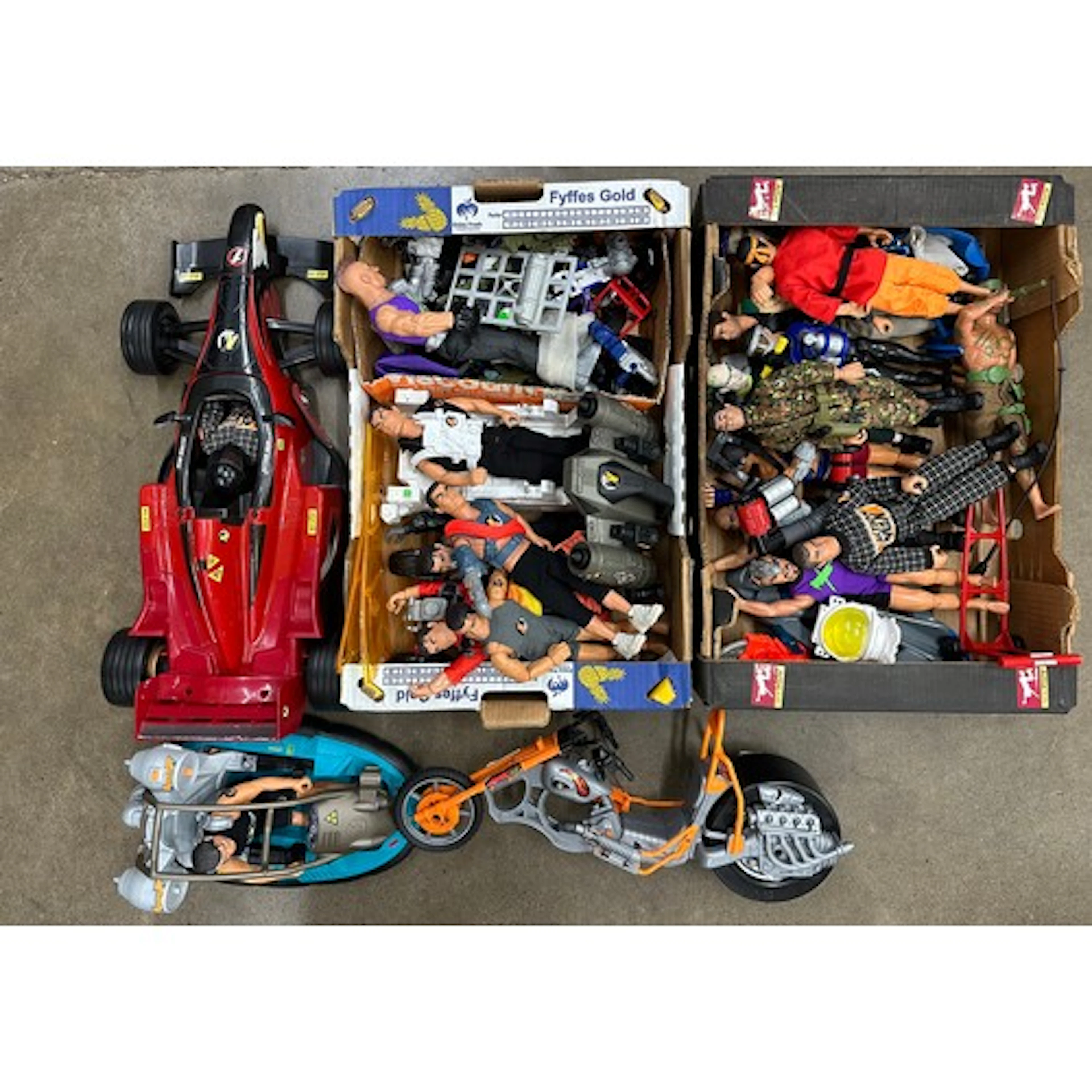 Three boxes of Action Man toys and related accessories *Not ...