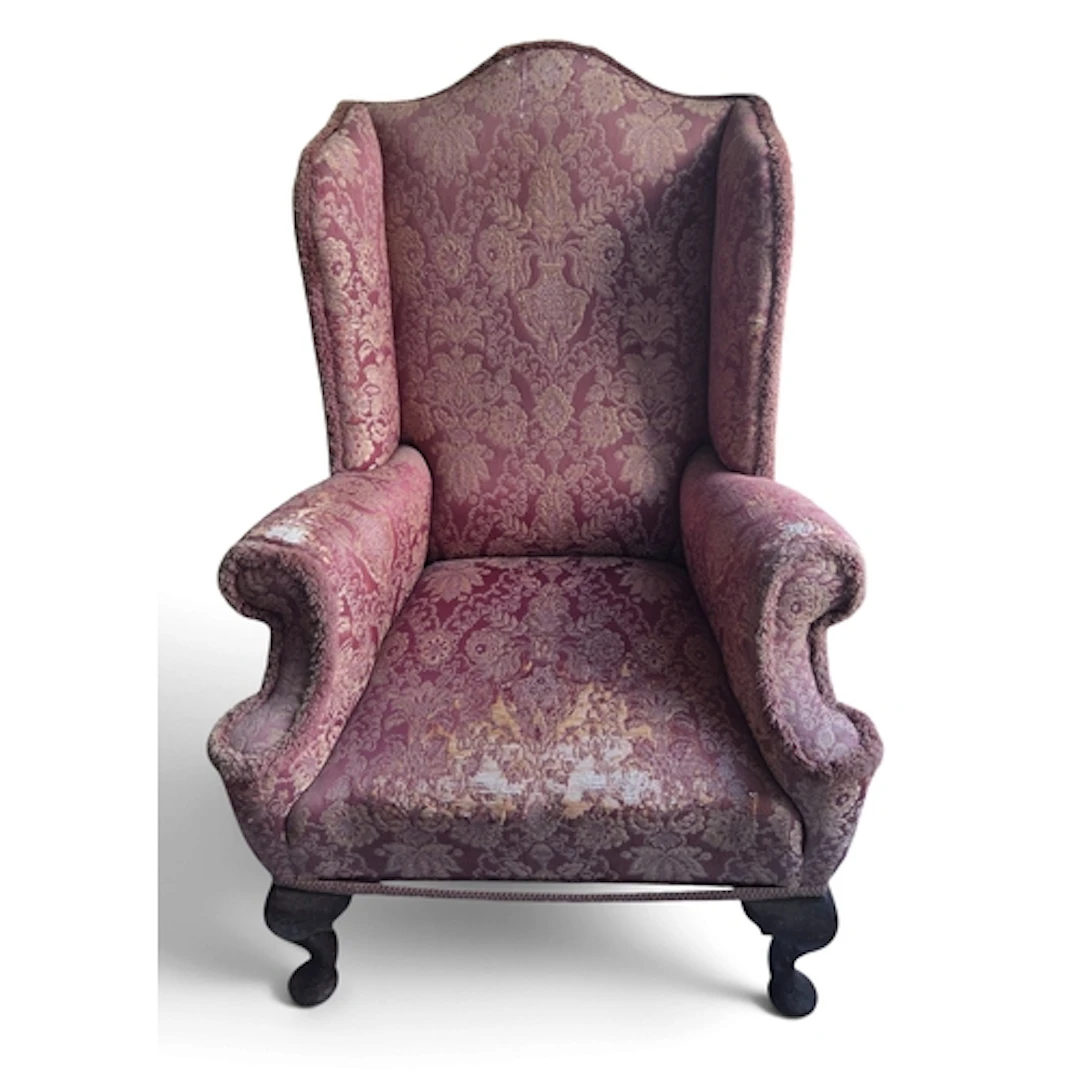 A good late 19th early 20th Century Wingback Chair with dama...