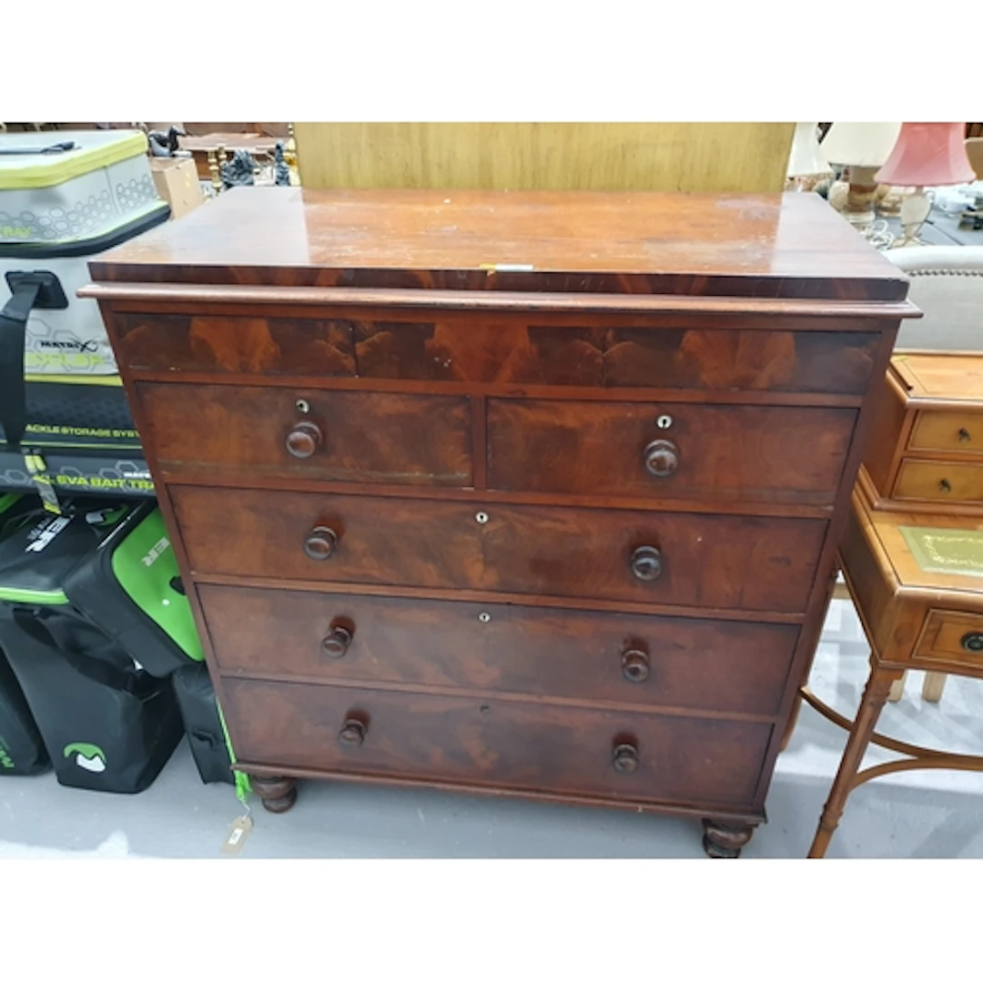 A mahogany Chest of drawers fitted two short over three long...