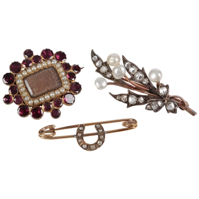 A collection of three brooches, late 19th/early 20th century...