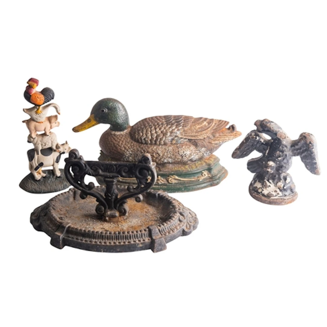 A group of three 20th Century door stops in the form of anim...