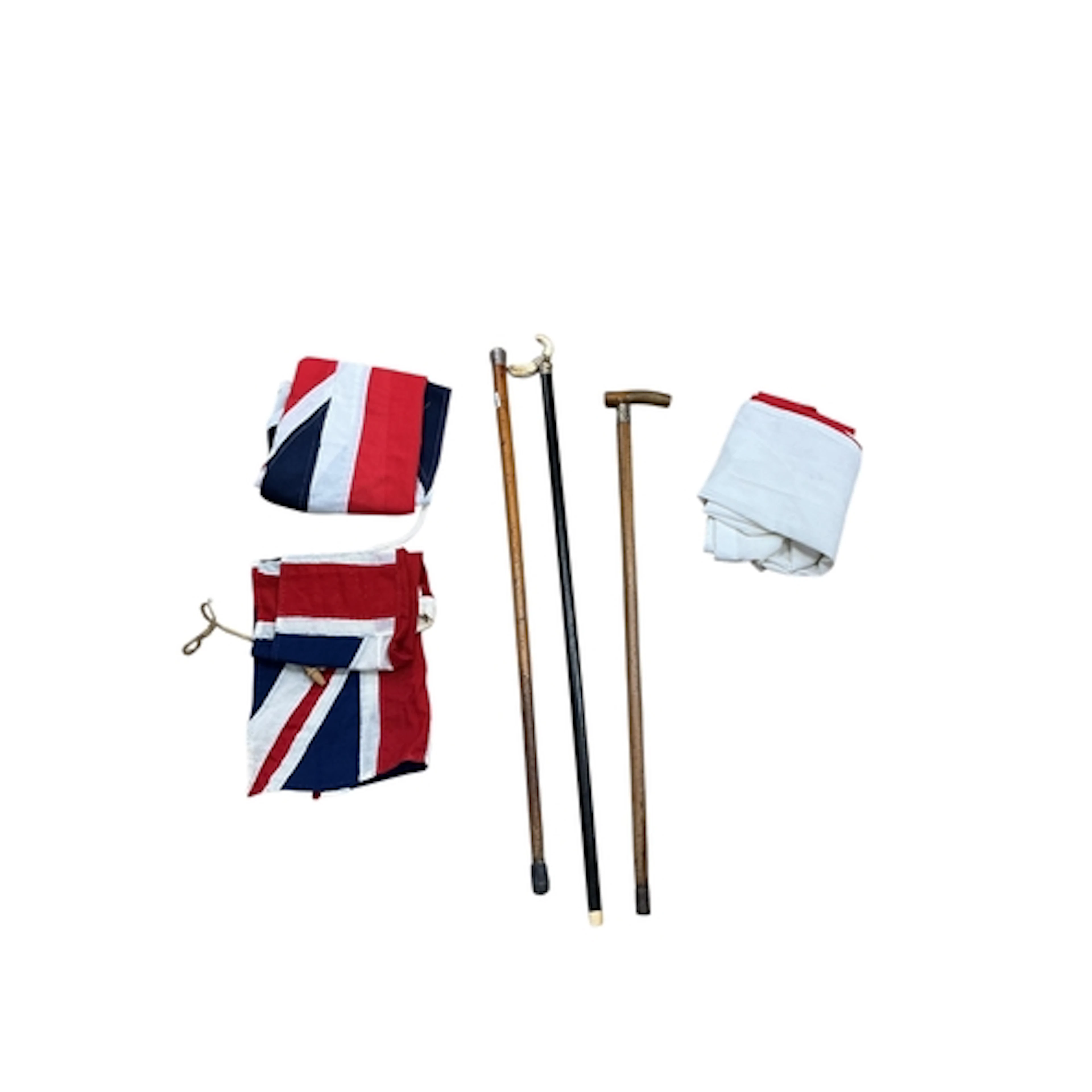 Three Victorian silver mounted canes, two union flags and a ...