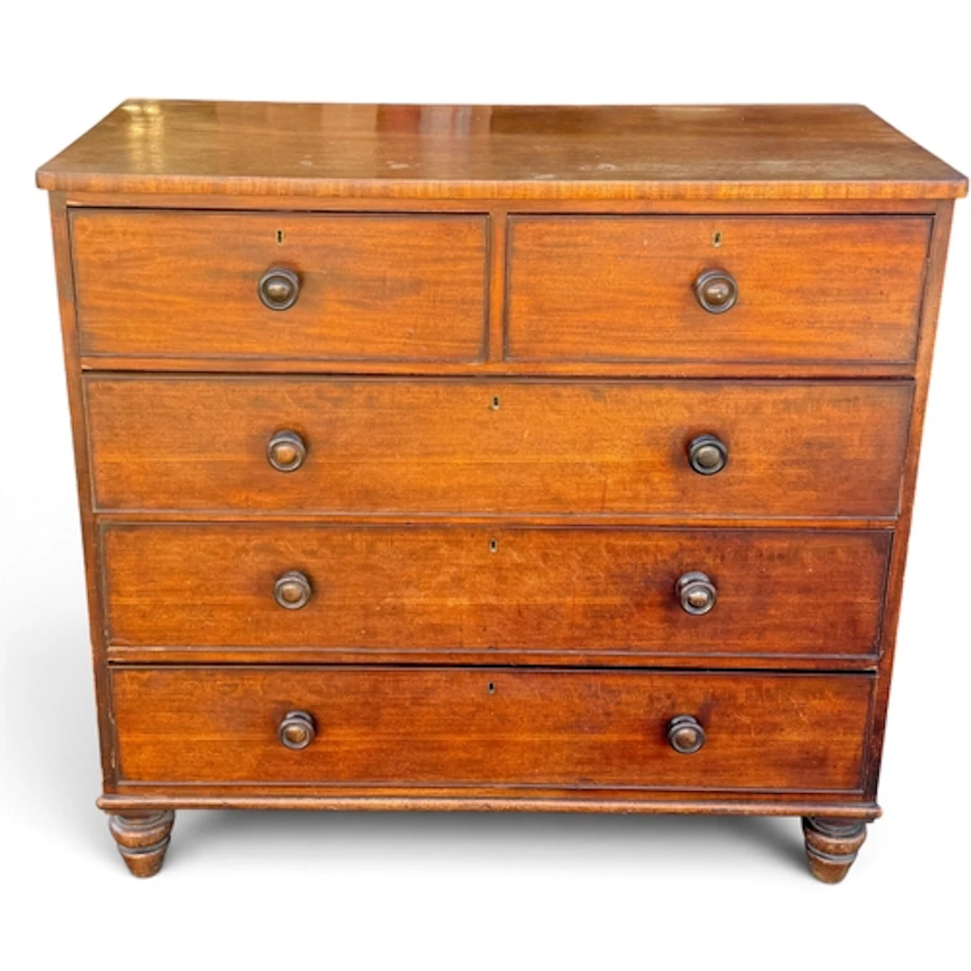 A VICTORIAN MAHOGANY CHEST OF DRAWERS Two short over three l...