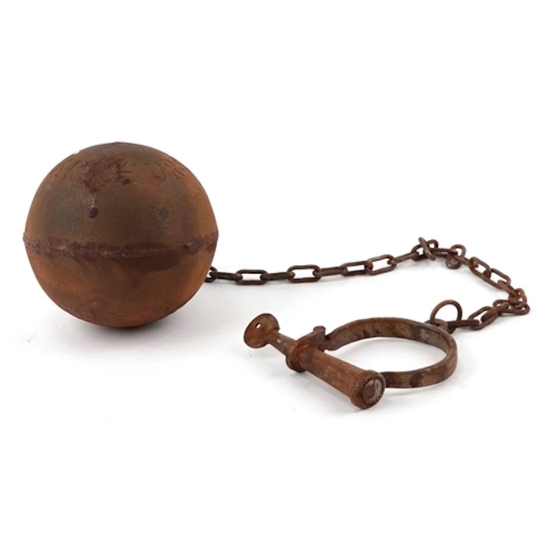 Decorative cast iron ball with chain with ankle cuff, the ba...