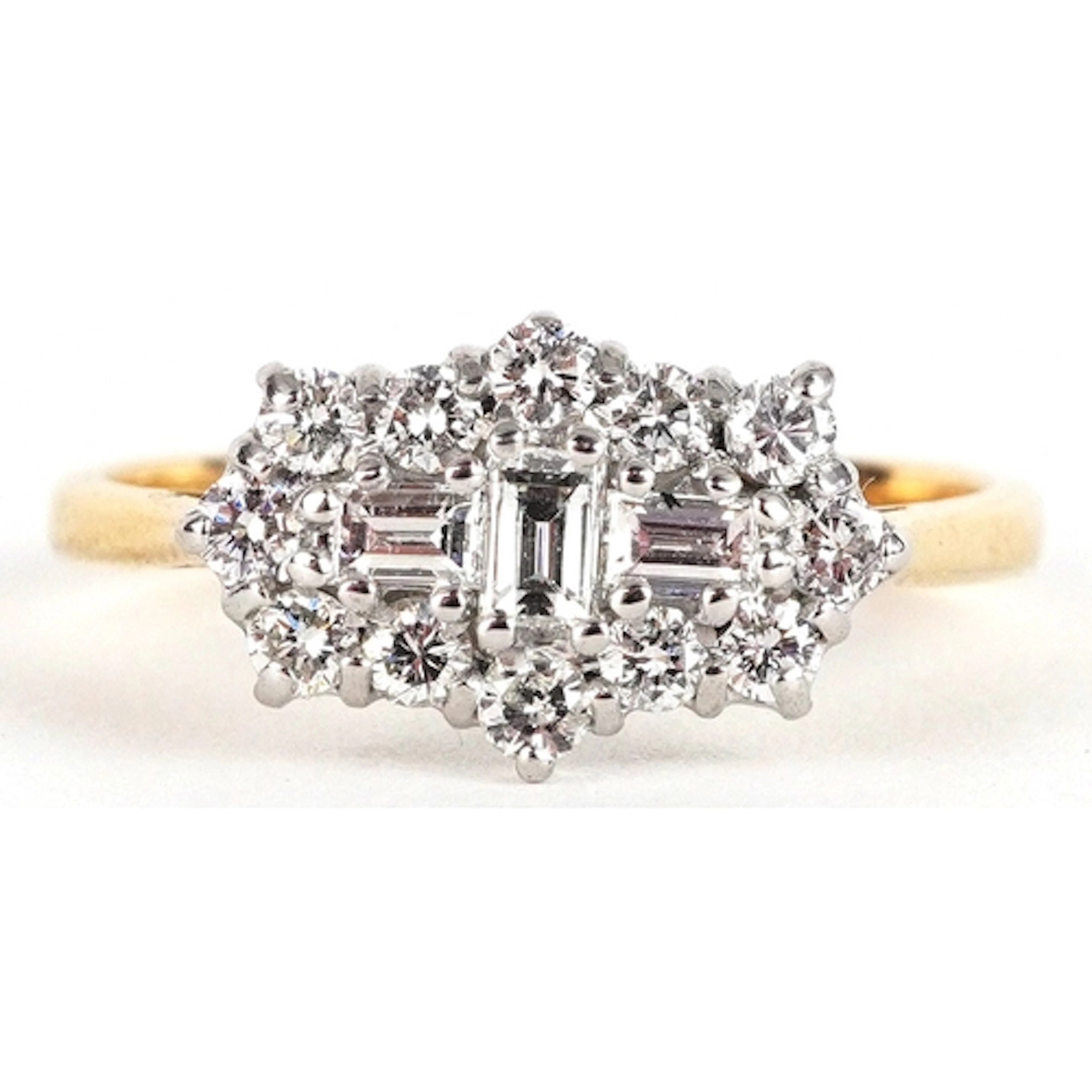 18ct gold diamond cluster ring set with baguette cut and rou...