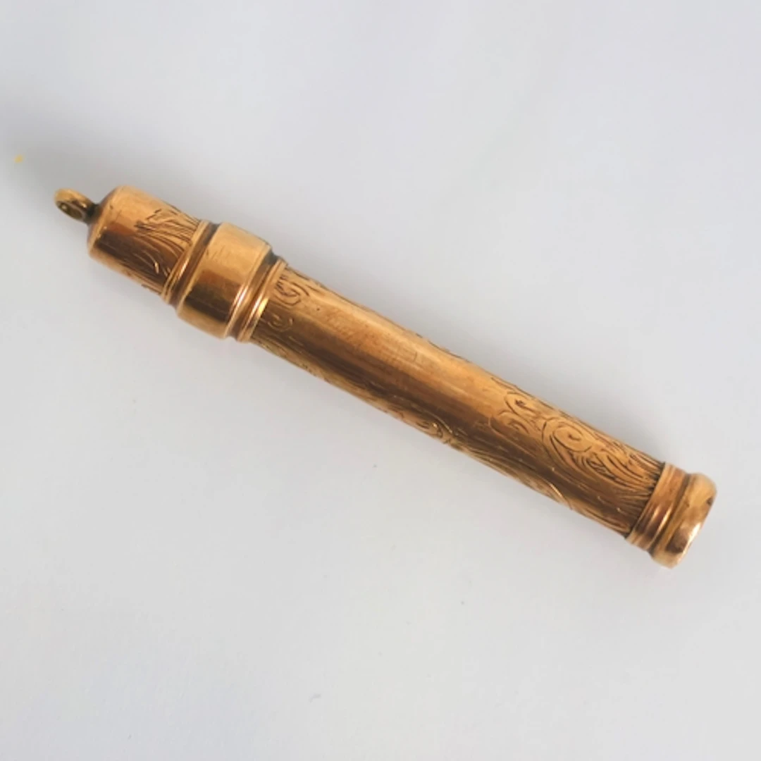 An early 20th century yellow metal propelling pencil, of typ...