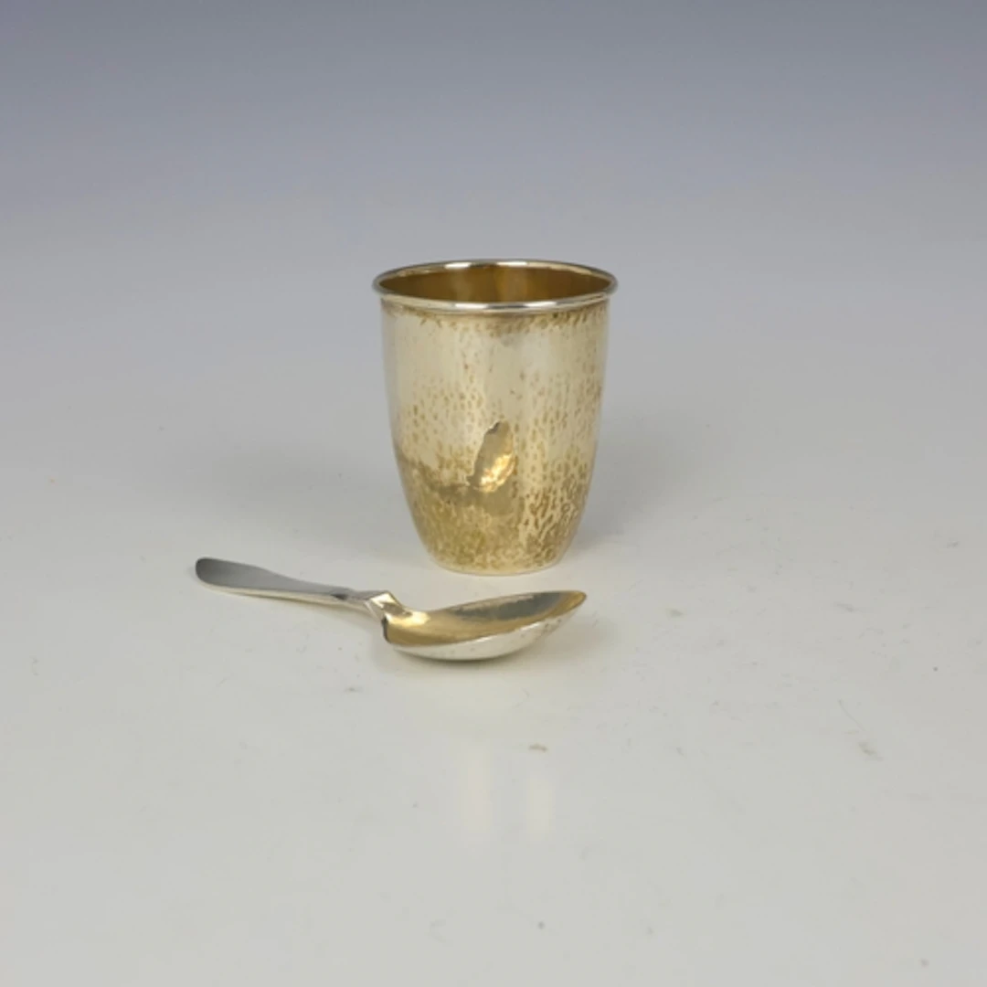 An early 20th century Georg Jensen silver beaker, of tapered...