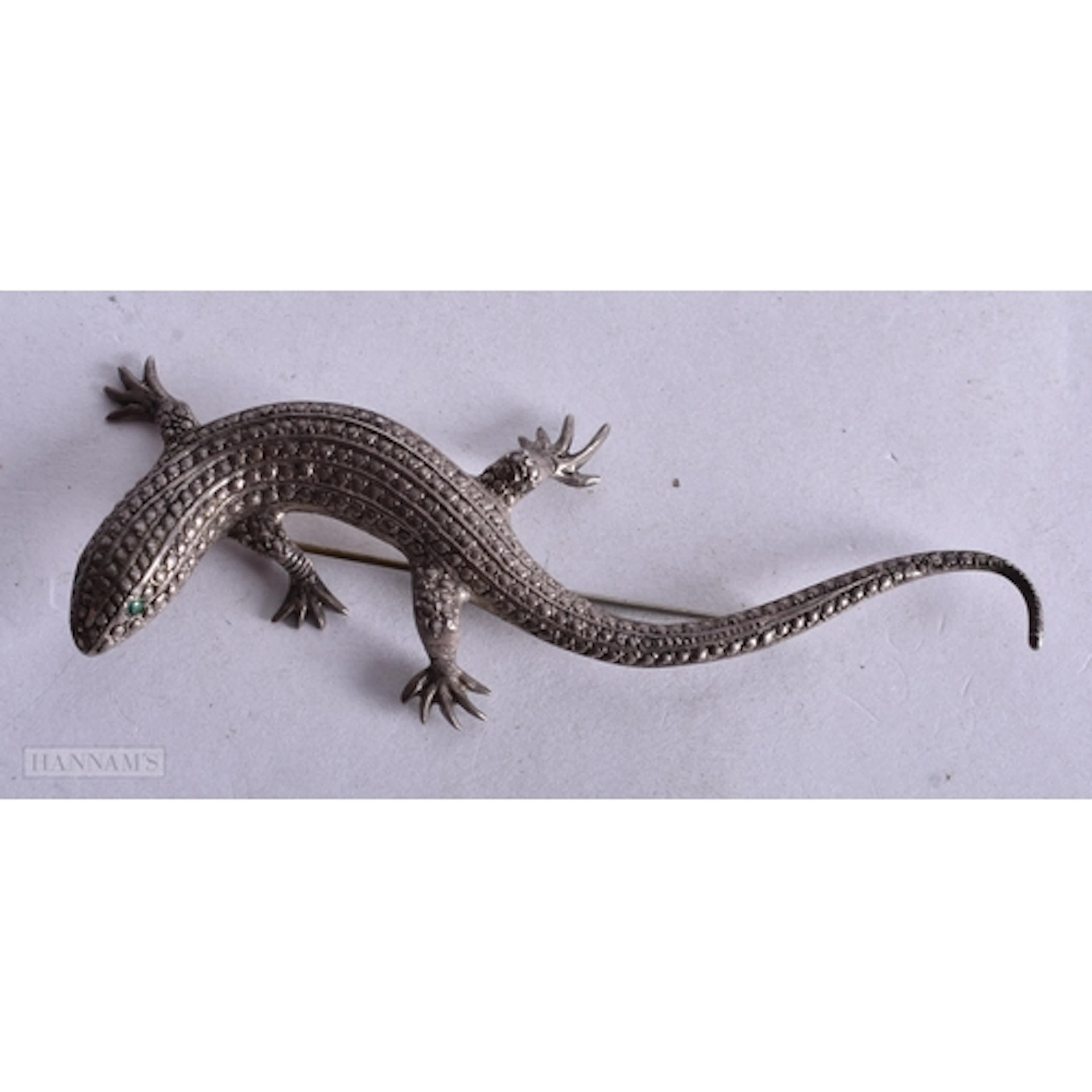 A SILVER LIZARD BROOCH marked 325. 10.2 x 3.6 cm. 20 grams