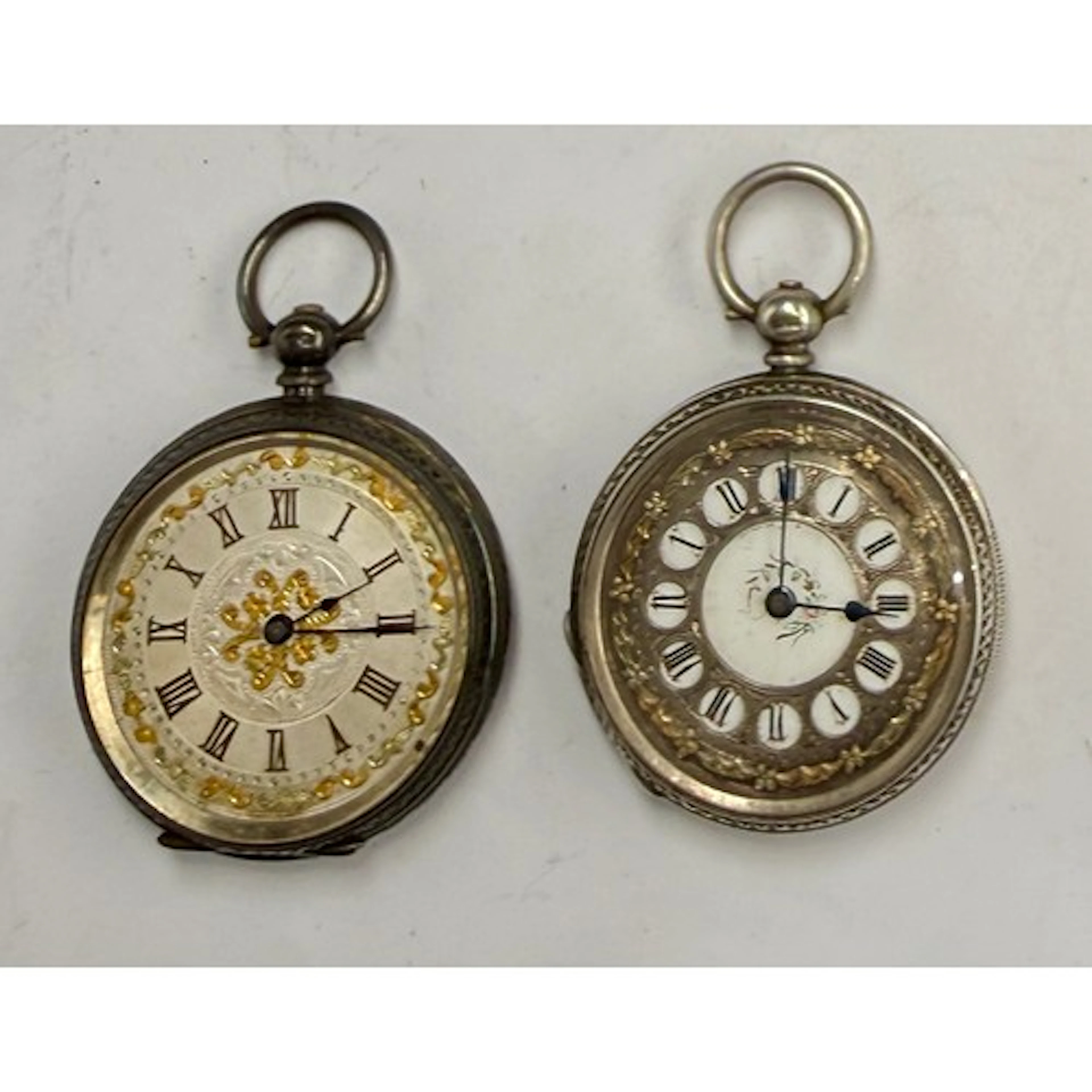 Two hallmarked silver cased ladies pocket watches. Total wei...