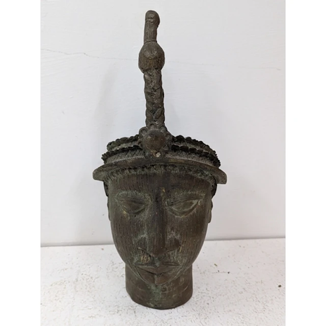 A 20th century Benin bronze head sculpture, styled from Ife ...
