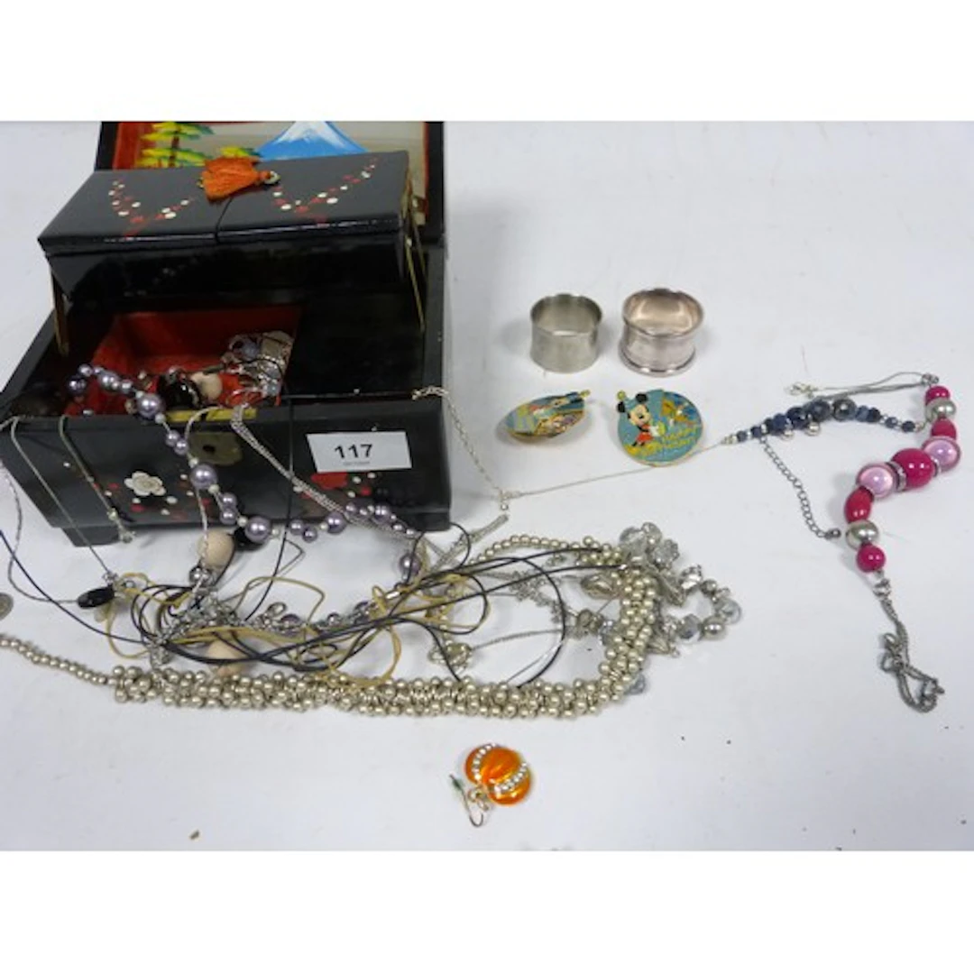Japanese laquared box of costume jewellery.