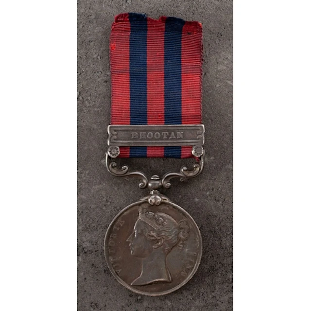 A Victorian India General Service Medal with Bhootan clasp t...