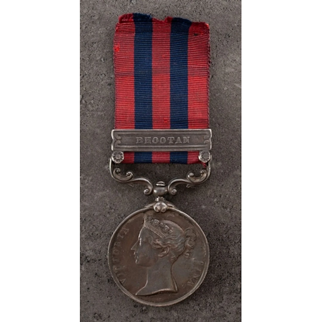 A Victorian India General Service Medal with Bhootan clasp t...