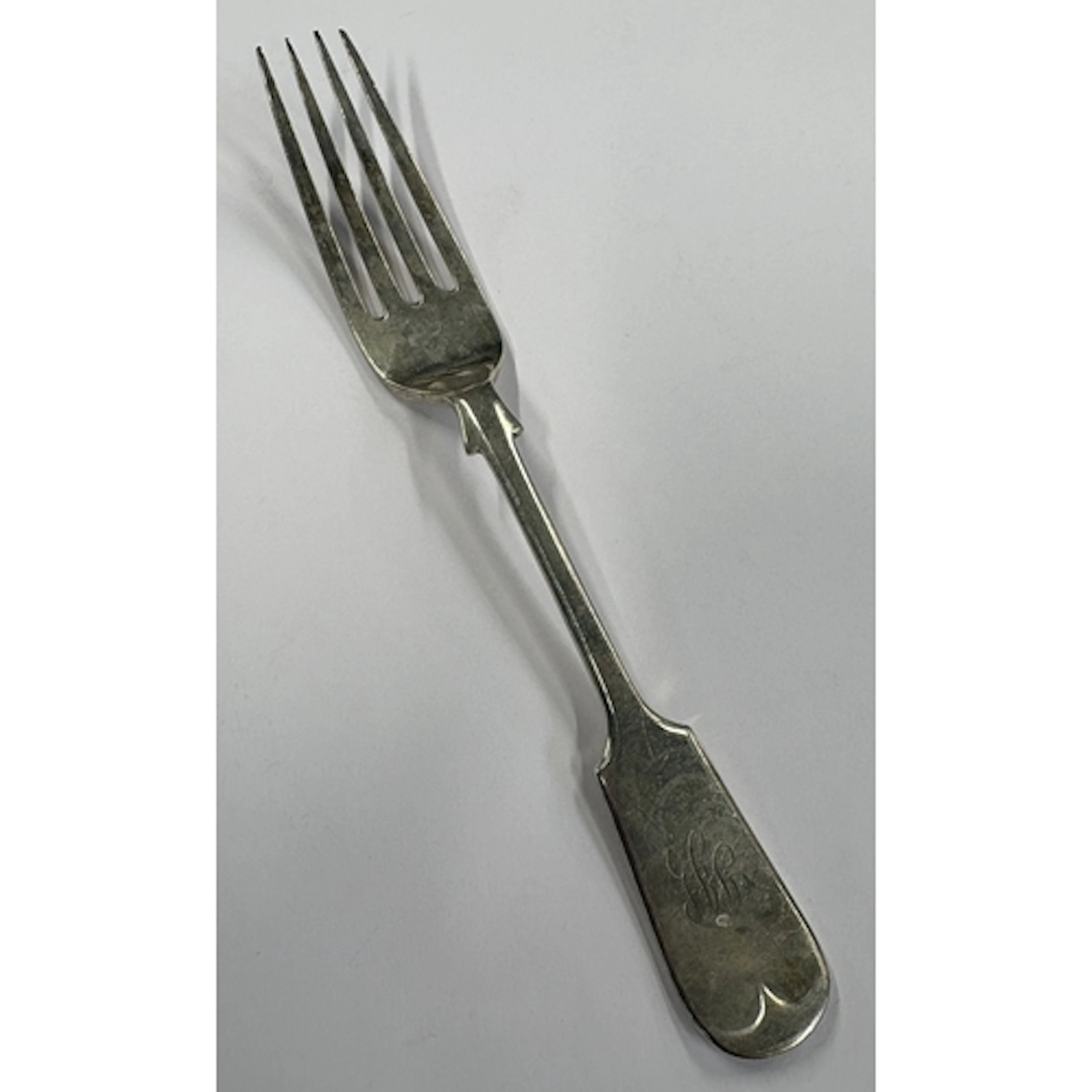 A silver table fork. London. By Walker & Hall. Approx. 5...