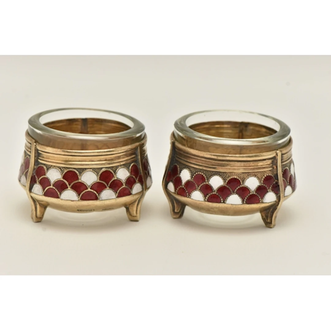 A PAIR OF RUSSIAN GILT METAL AND ENAMEL SALTS, cauldron form...