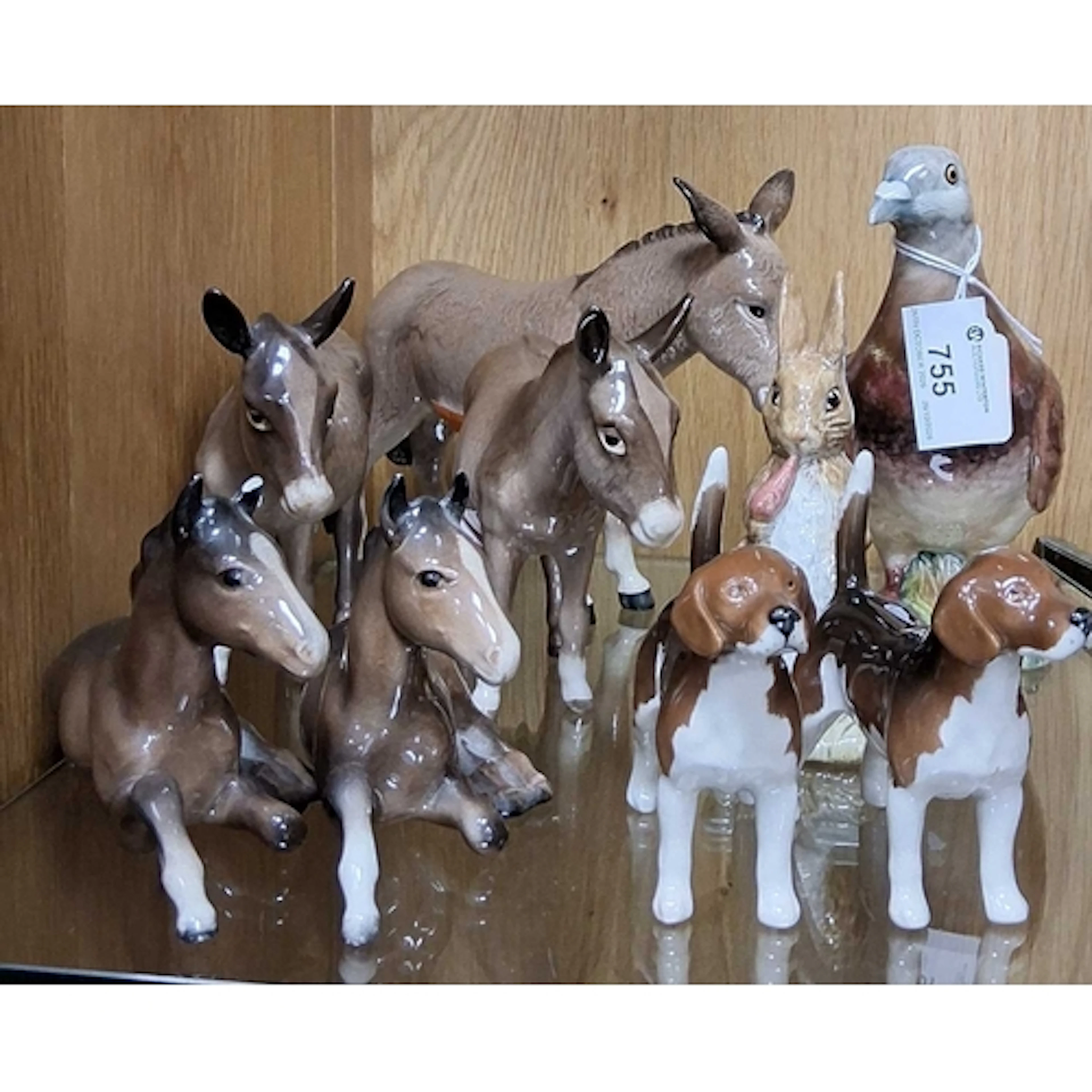 A GROUP OF BESWICK ANIMALS SCULPTURES, comprising Pigeon, fi...