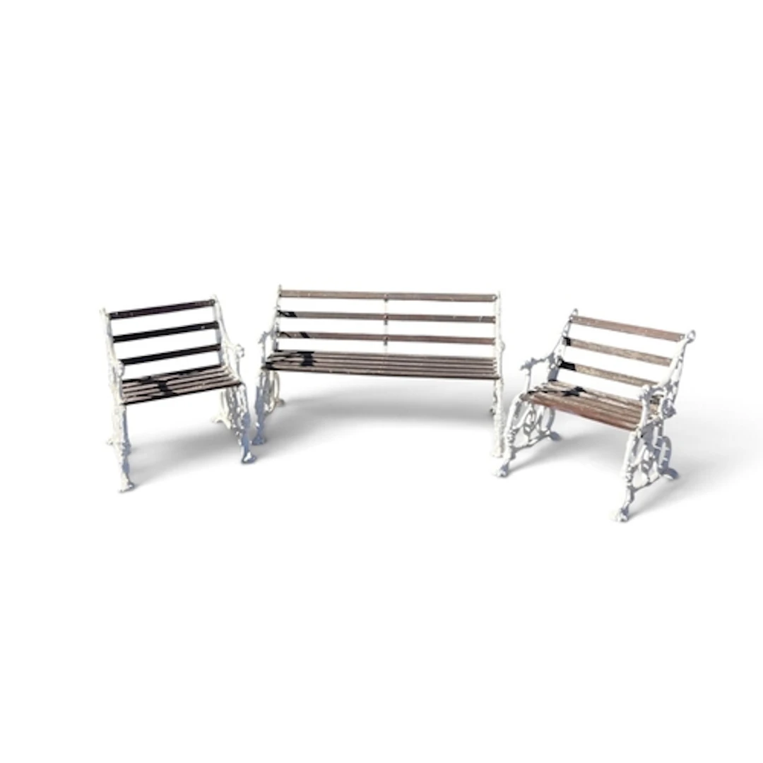 A VICTORIAN STYLE WHITE PAINTED CAST IRON GARDEN BENCH AND P...