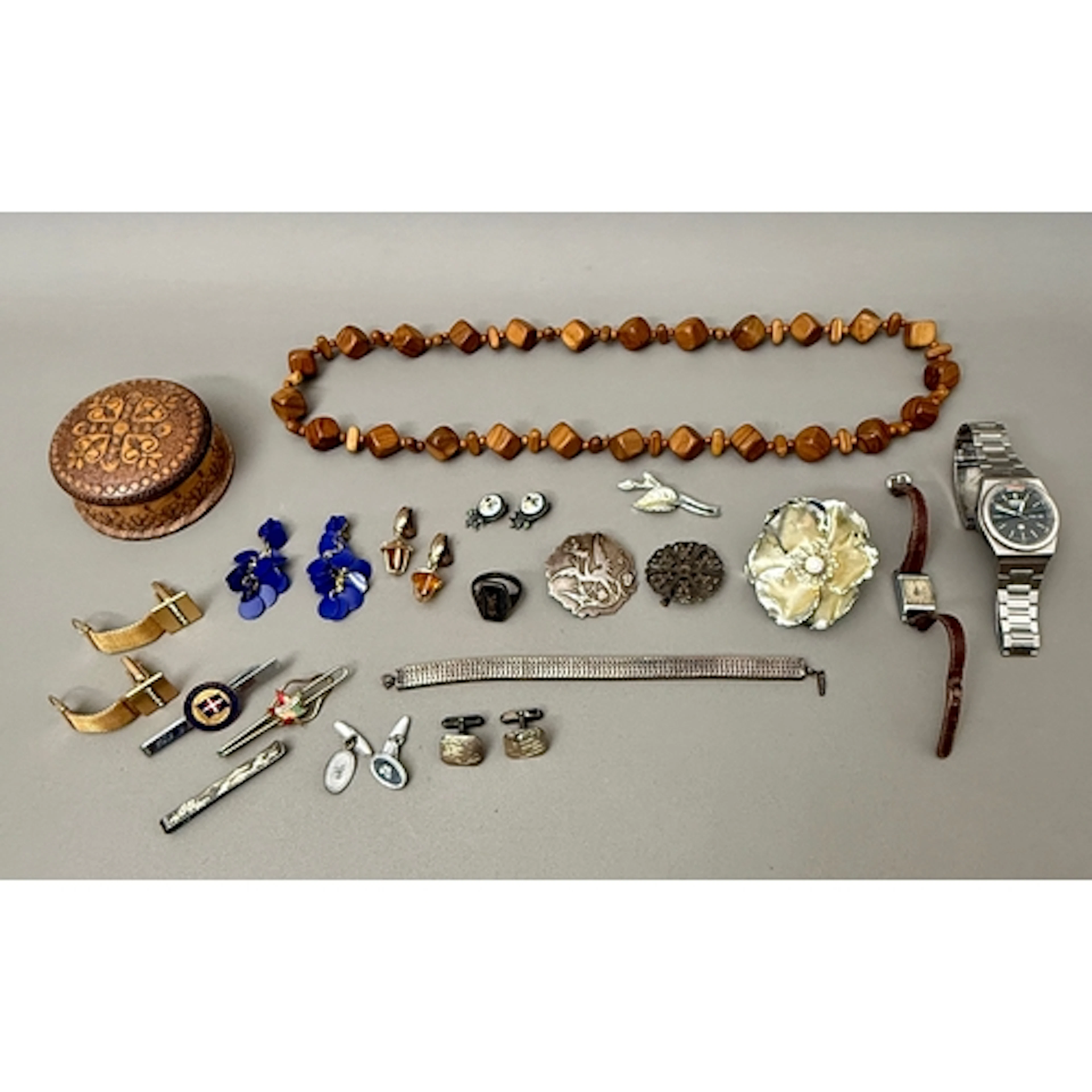 A small group of silver, white metal and costume jewellery a...