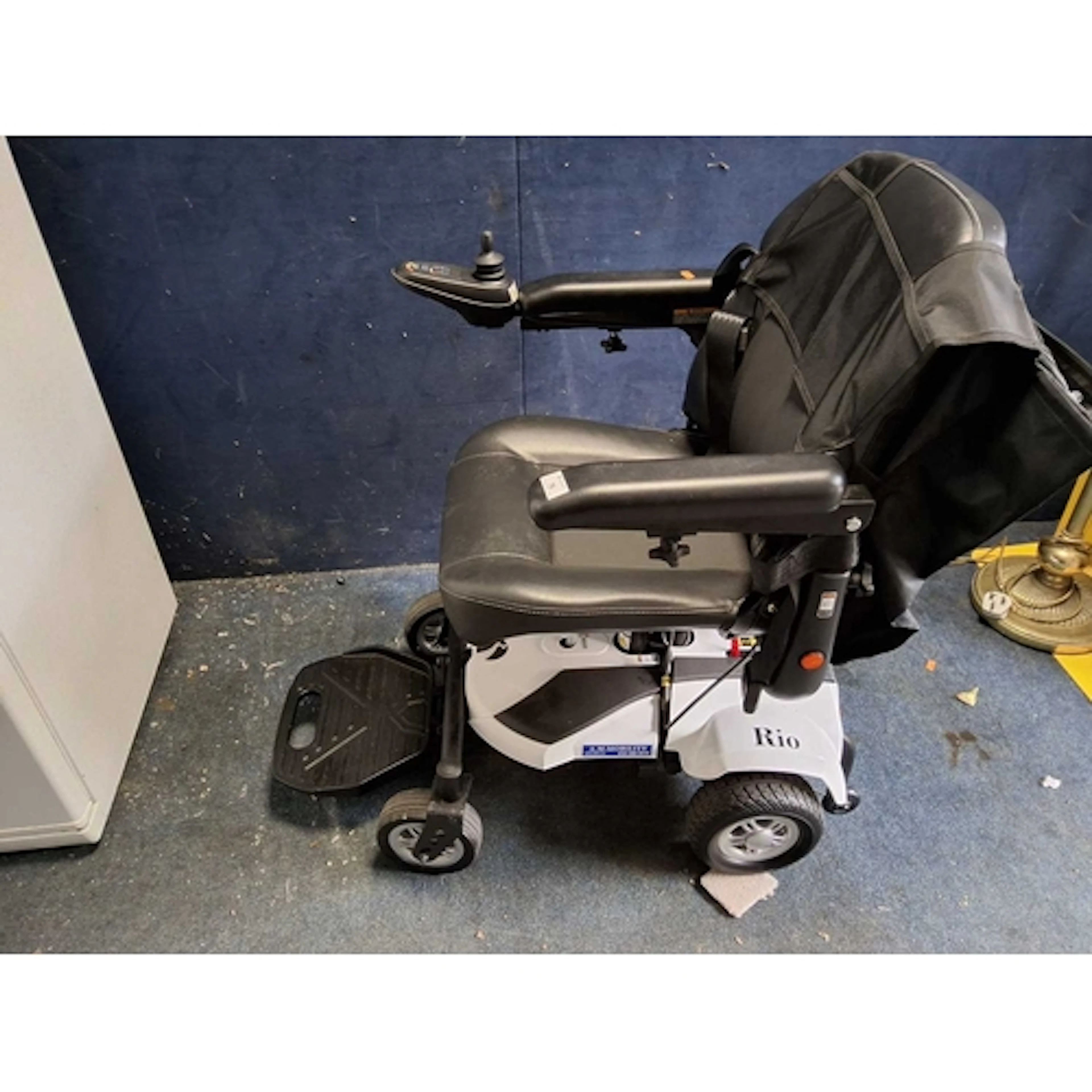 A RASCAL RIO ELECTRIC WHEELCHAIR (PAT pass and working, but ...