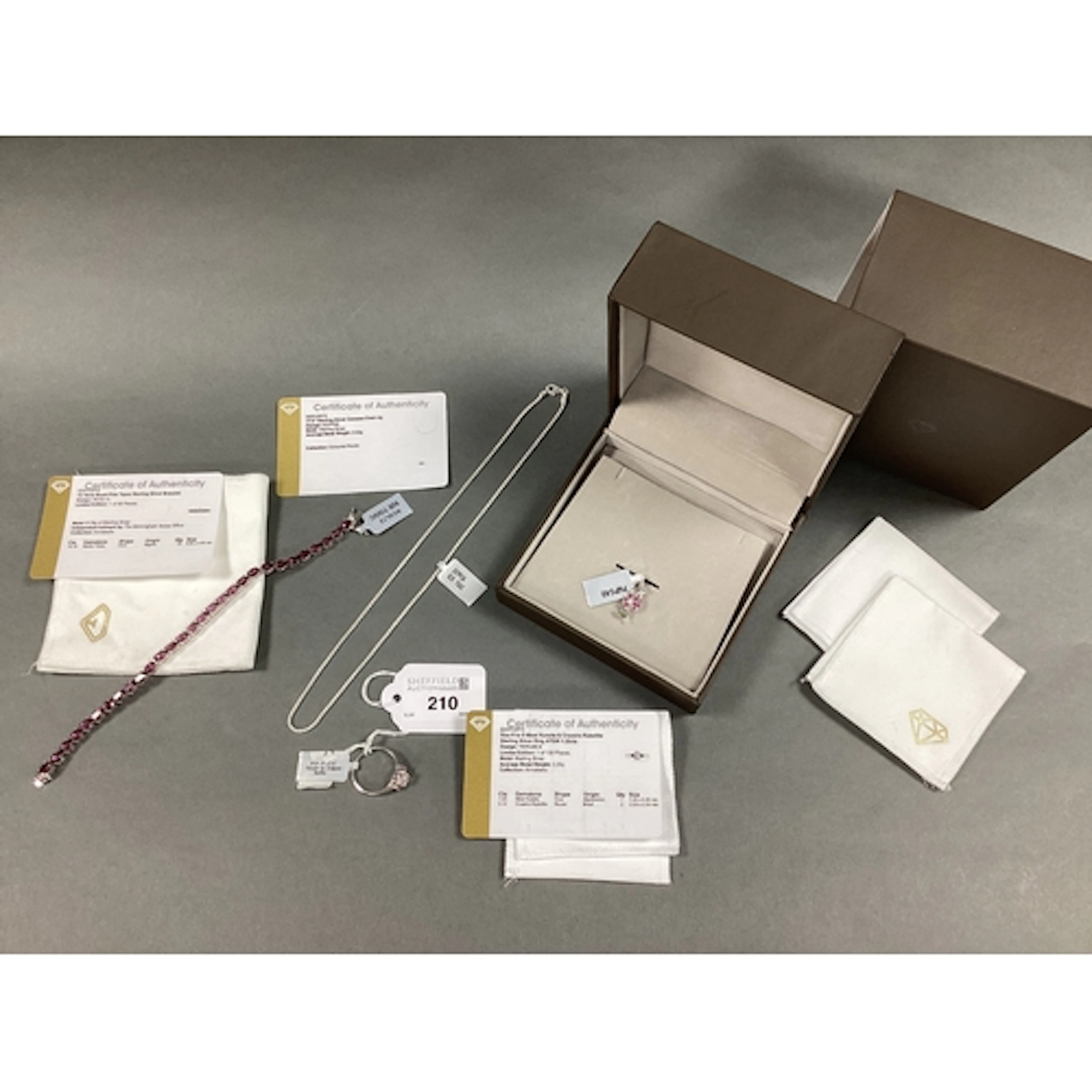 The Genuine Gemstone Company; A Hallmarked Silver Blush Pink...