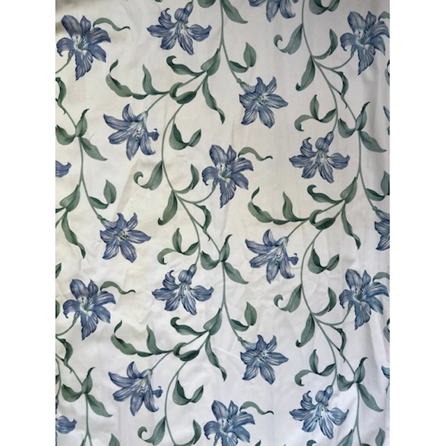 Three lined curtains in a blue lily print, approx. 215cm dro...
