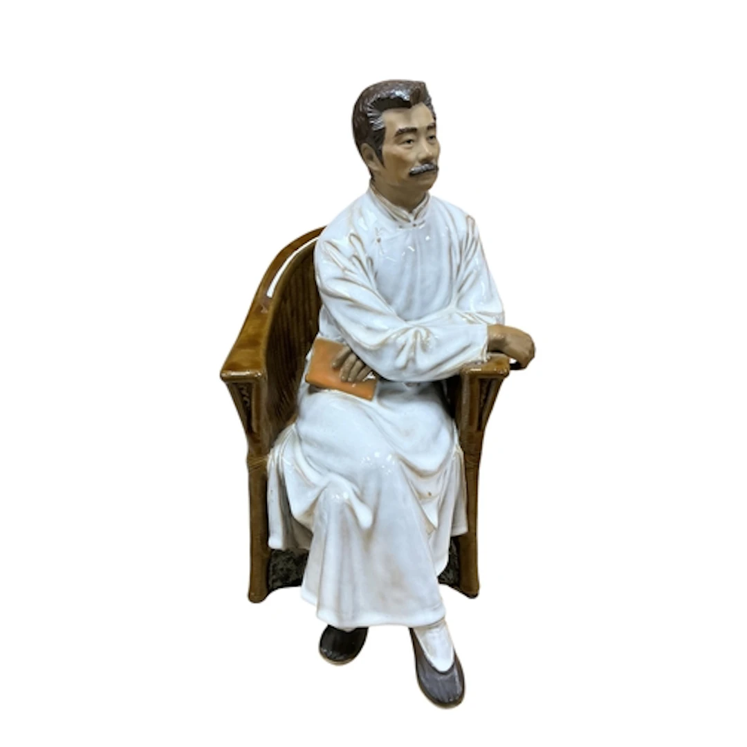 A Chinese Shirwan pottery glazed figure of the Chinese poet ...