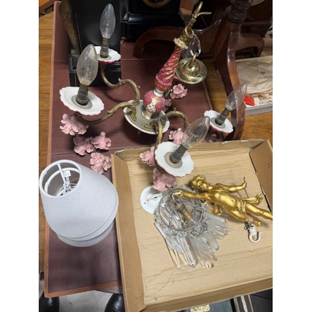 A TWO-TIER CIRCLET PENDANT LIGHT FITTING HUNG FROM A GILT CH...