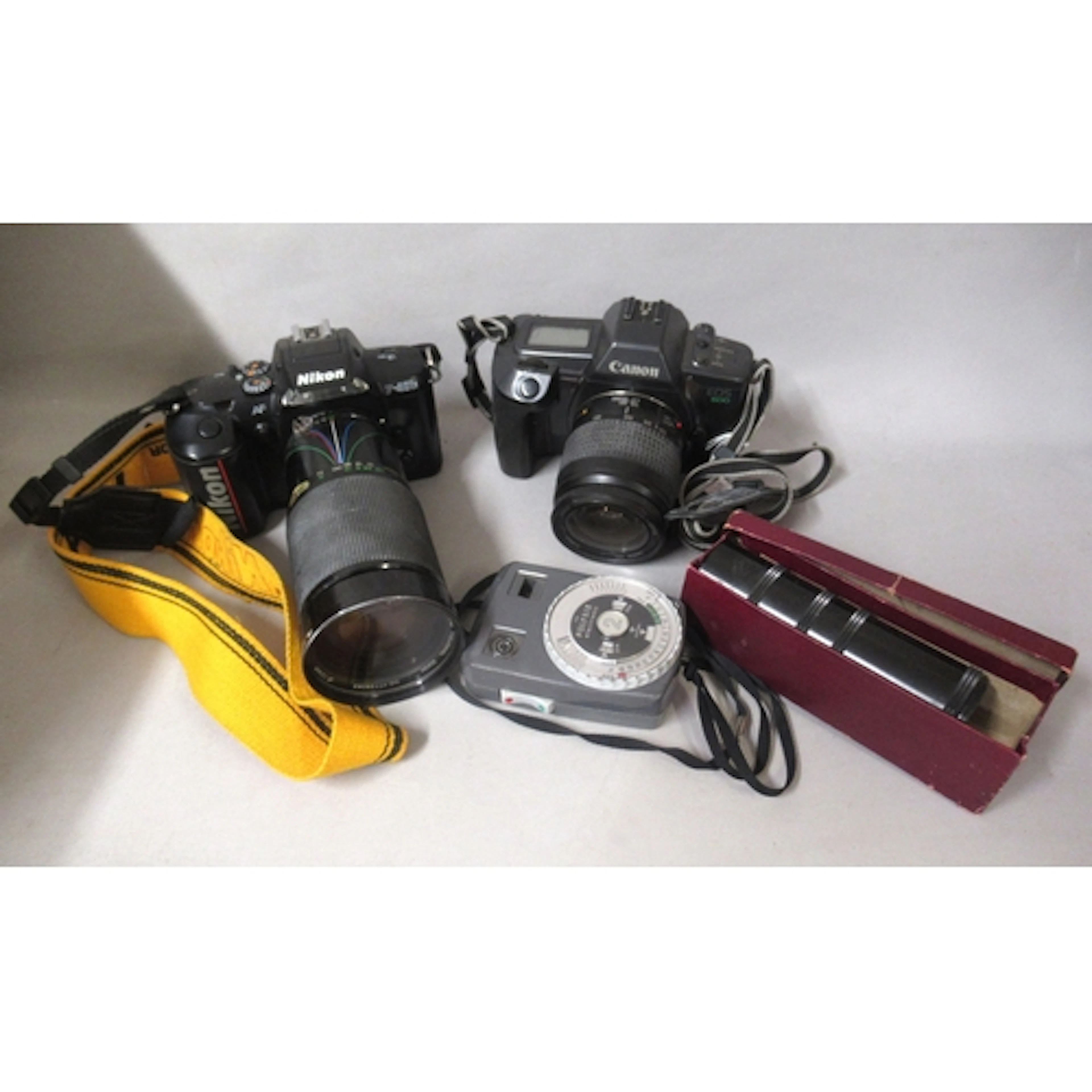 Quantity of various cameras by Nikon and Canon, together wit...