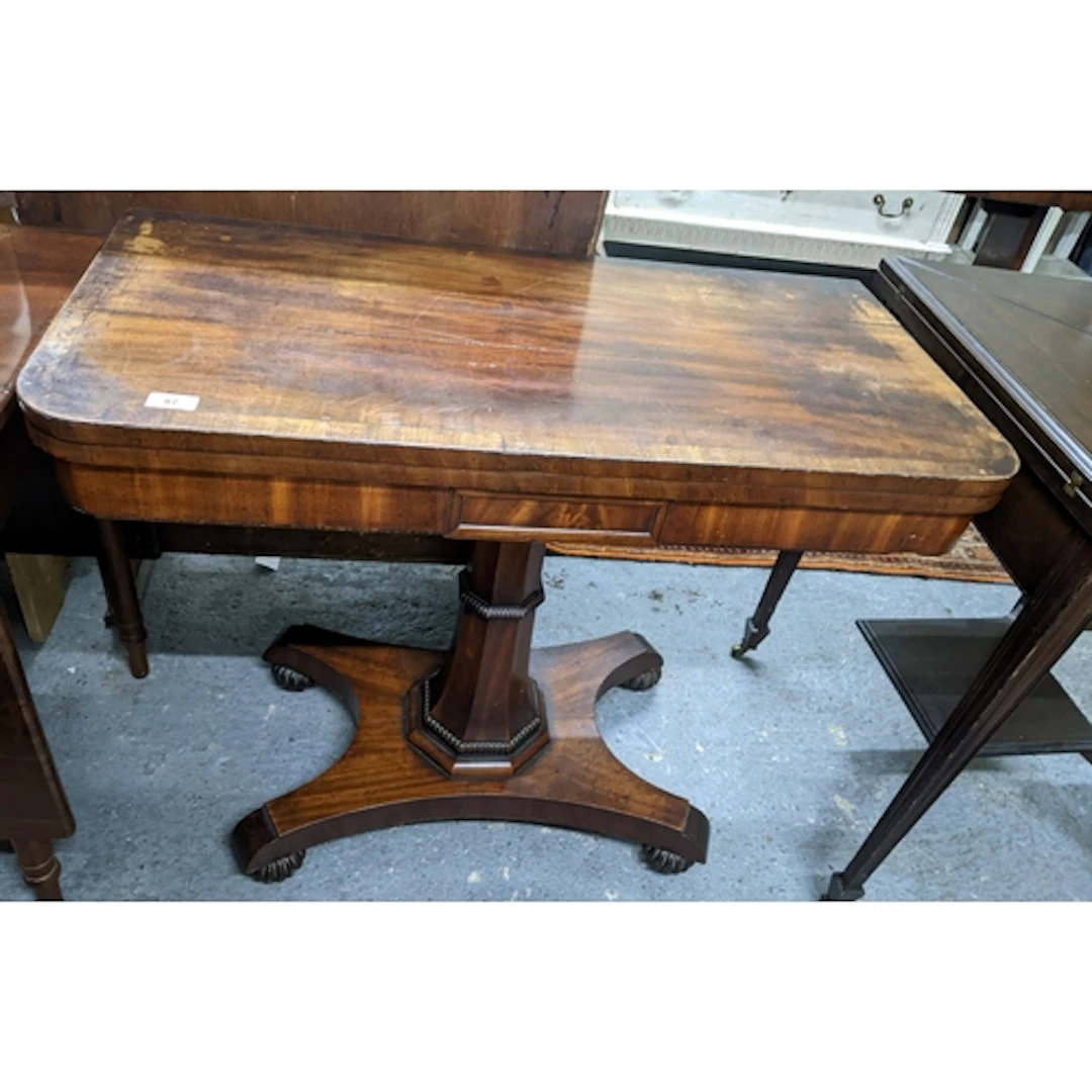 A Regency mahogany fold over and swivel topped card table, o...