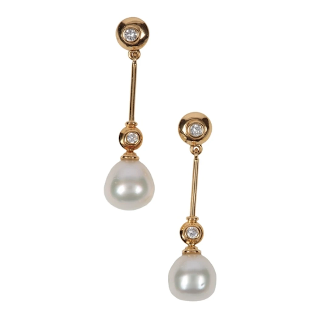 A pair of cultured pearl and diamond earrings, collet-set wi...