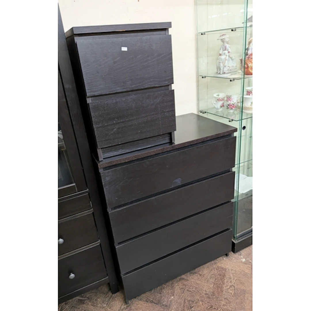 Ikea dark wood chest of four long drawers with a matching tw...