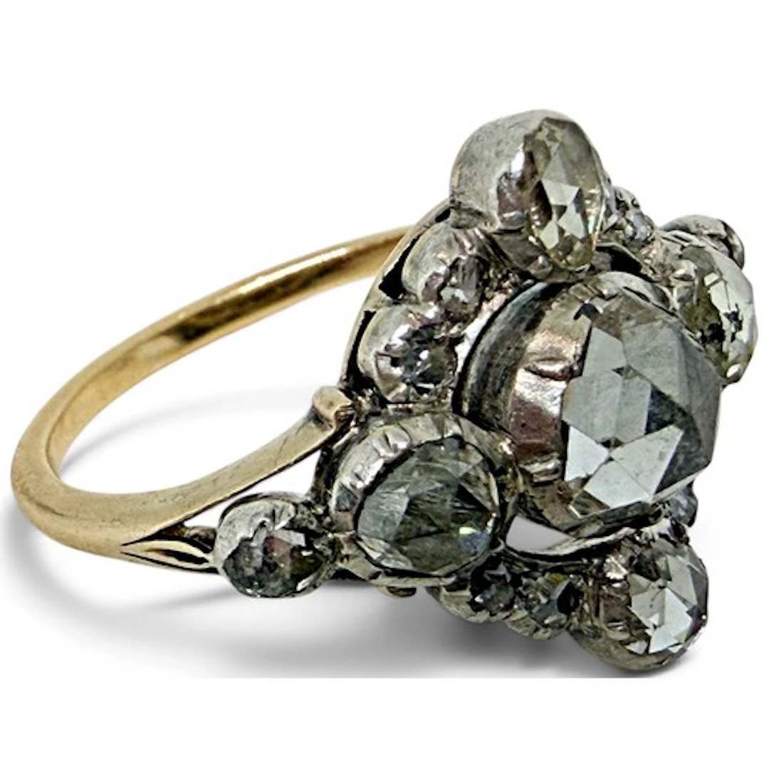 A Georgian diamond ring, set with rose-cut diamonds in a clo...