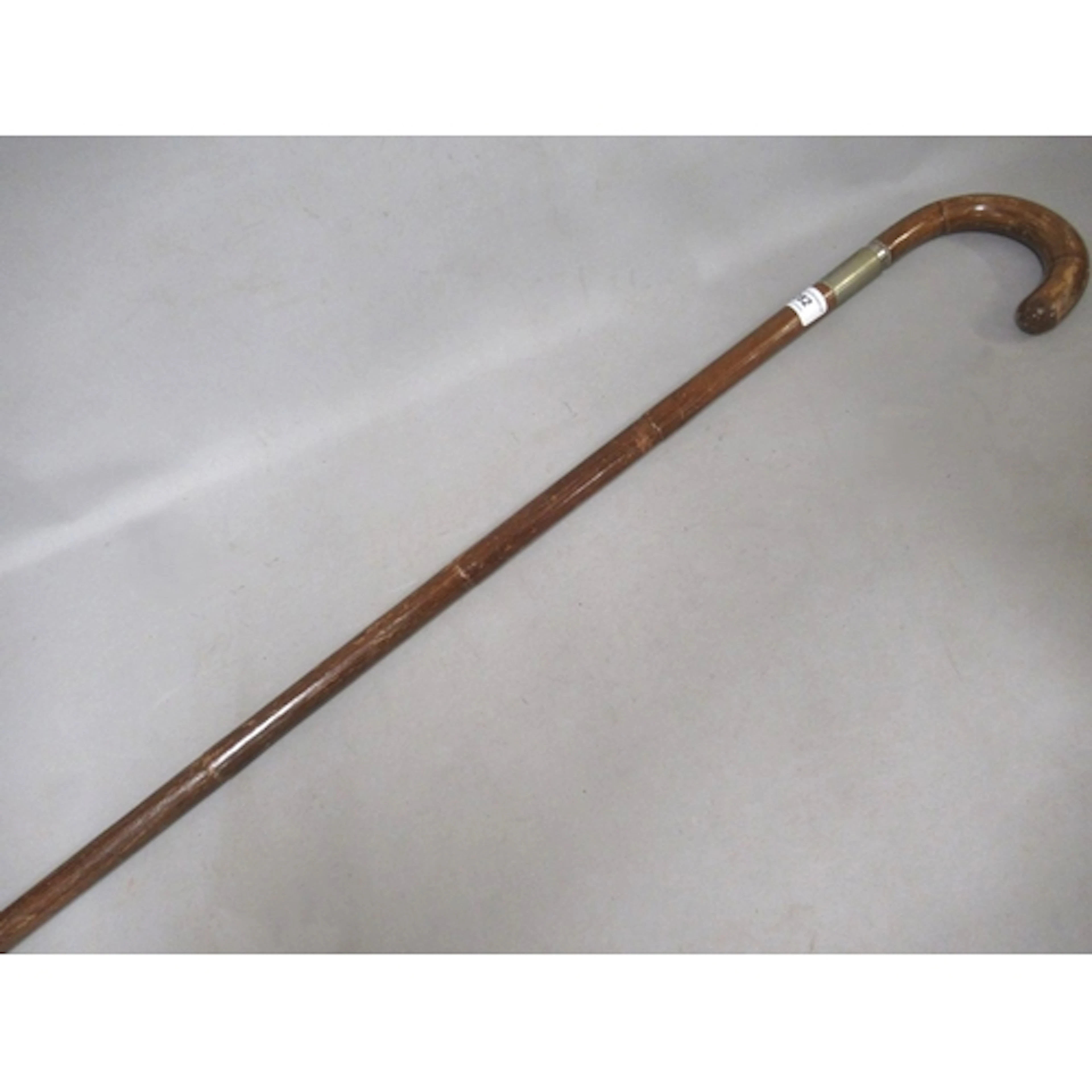 Unusual bamboo walking cane, enclosing a fold out camera tri...