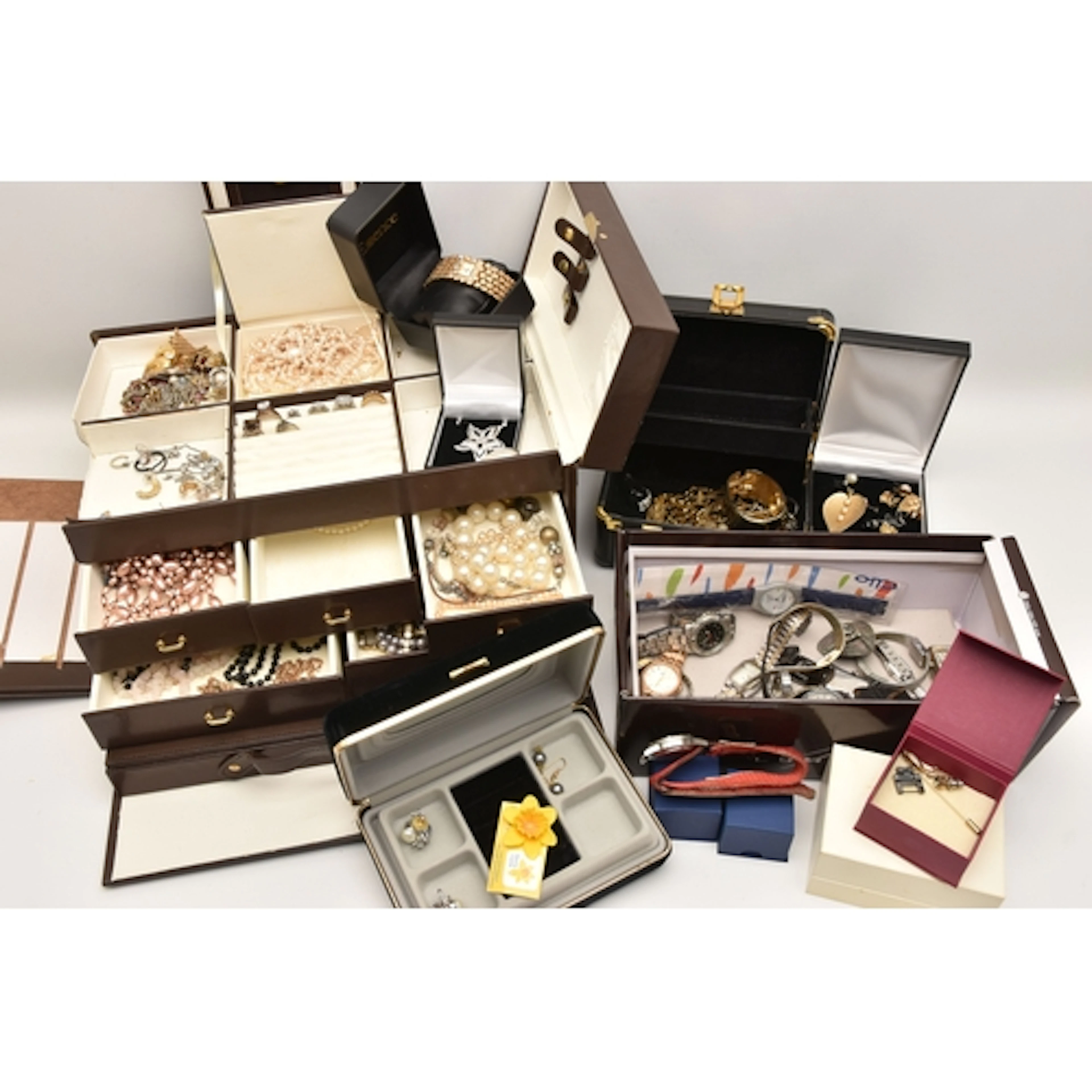 A LARGE ASSORTMENT OF COSTUME JEWELLERY AND WATCHES, a large...