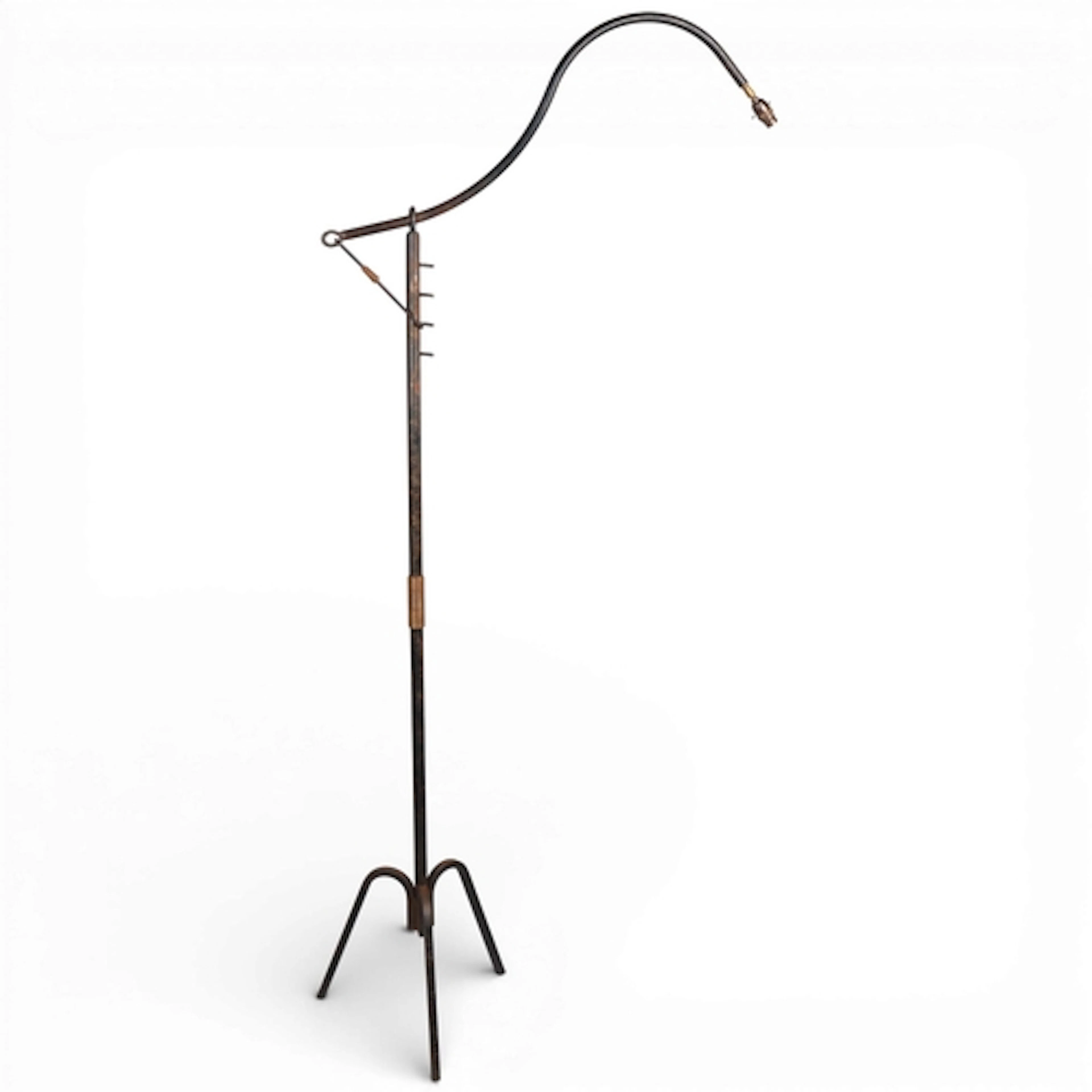 A vintage French blackened iron floor lamp with pivot arm an...