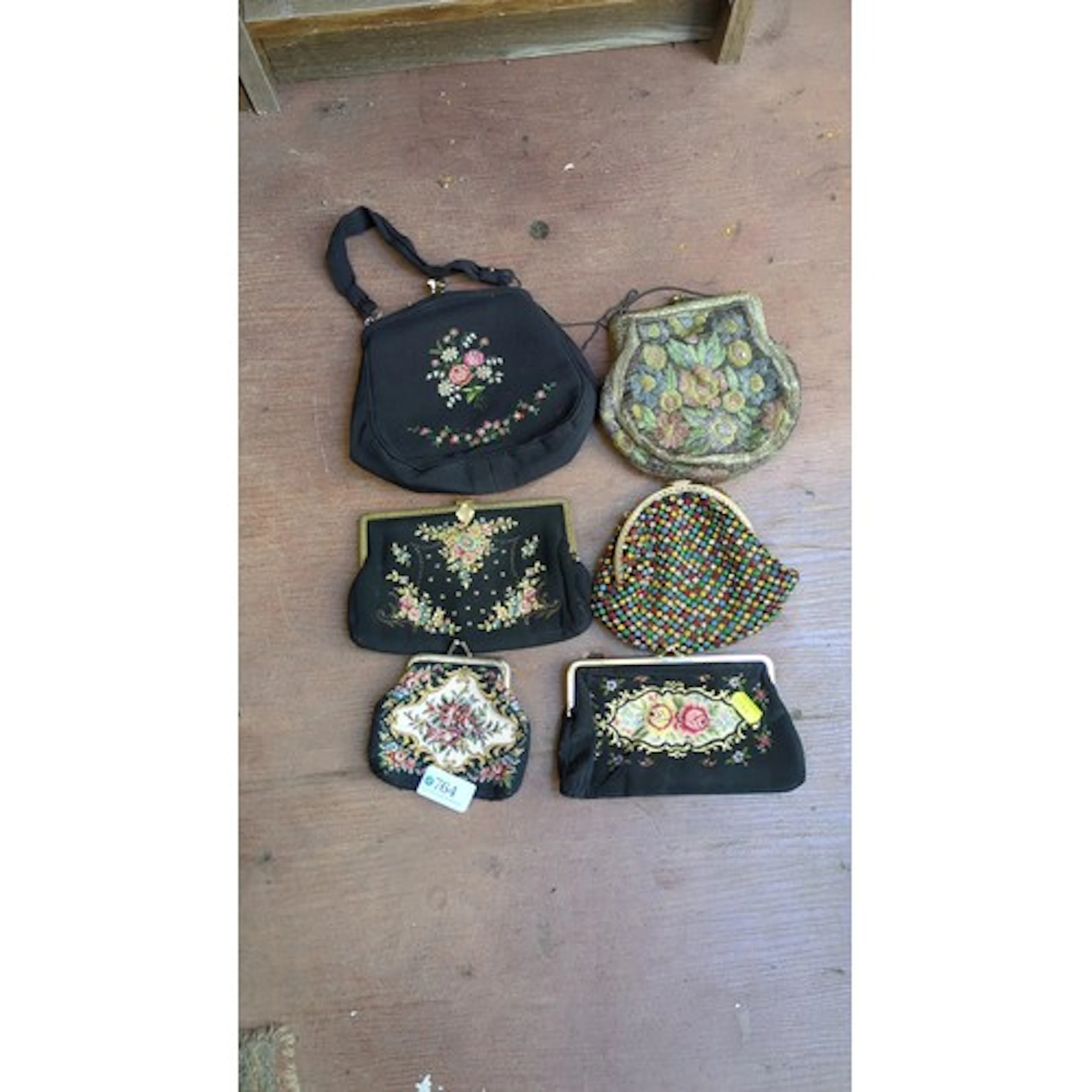 A group of vintage evening handbags comprising embroidered b...