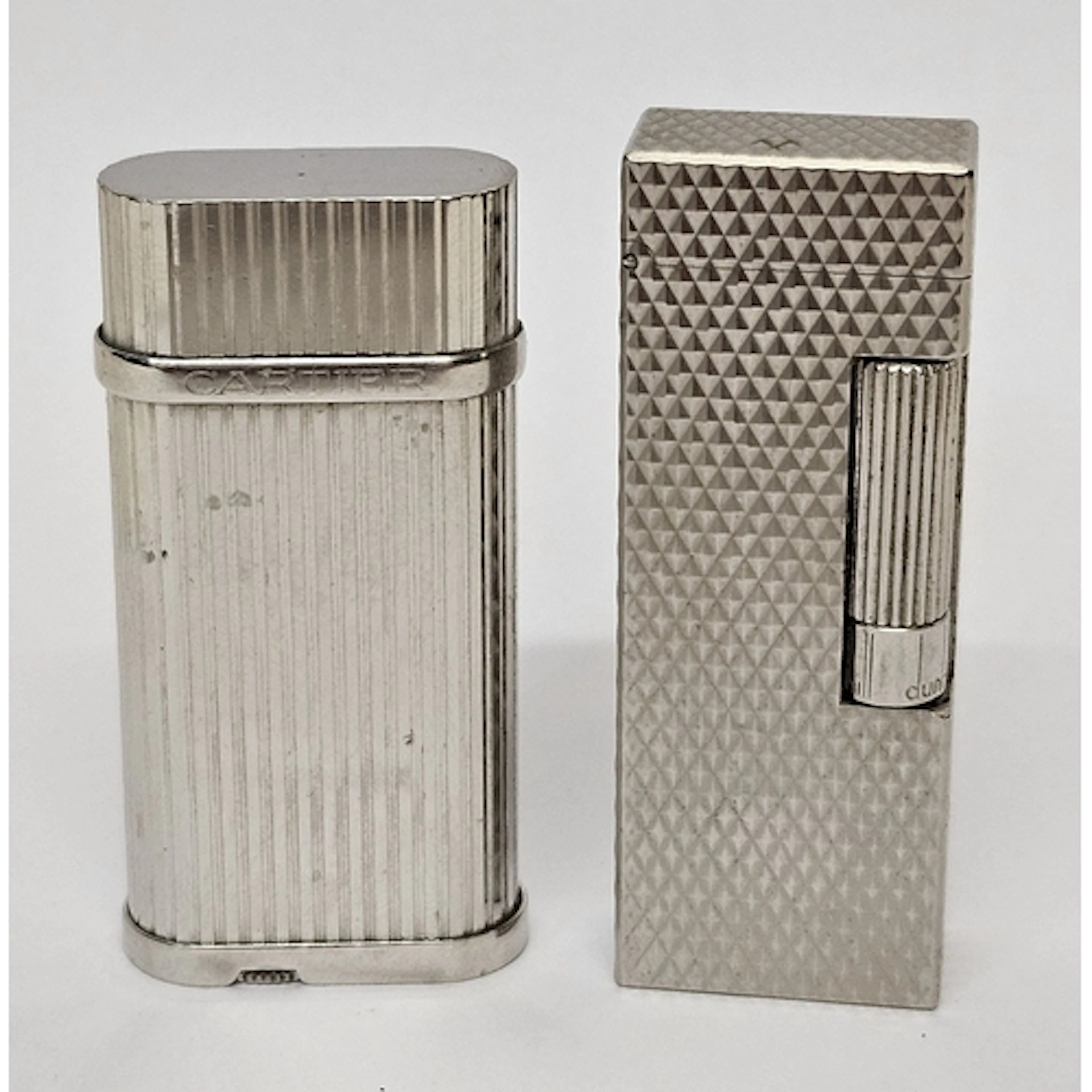 Cartier Pocket Lighter, oval bright polished body with engin...